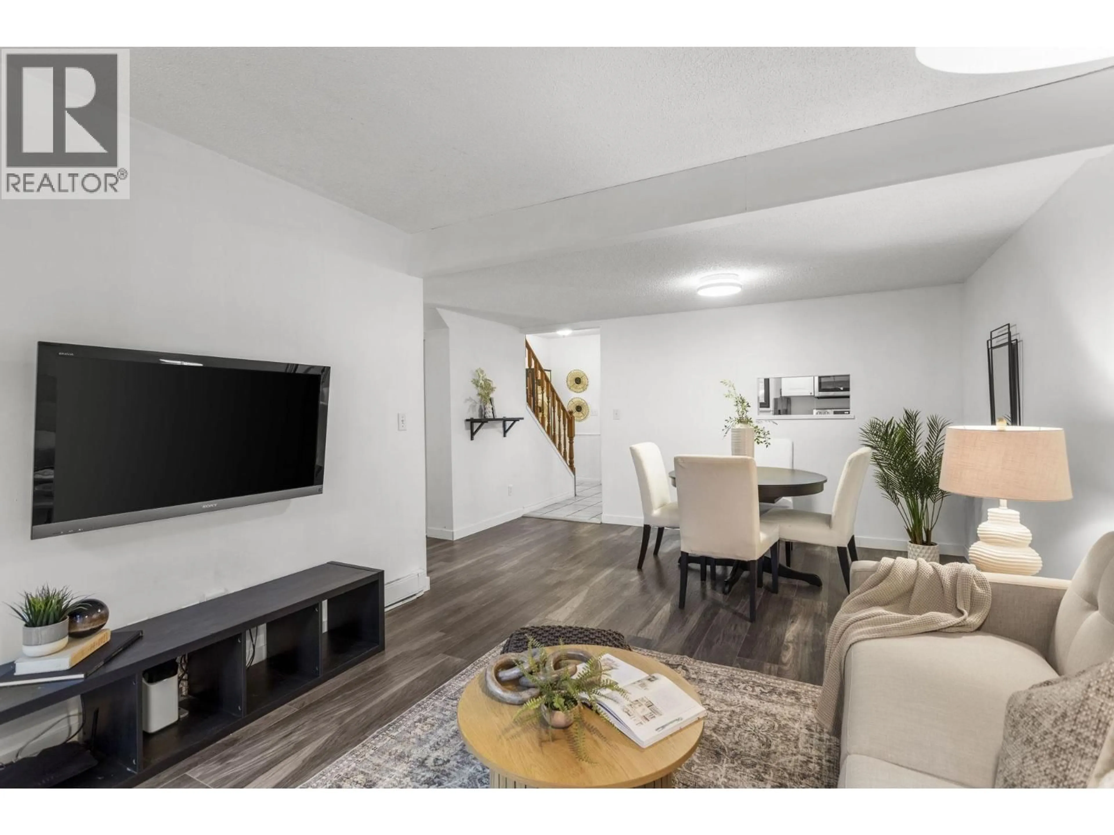 Living room with furniture, wood/laminate floor for 865 BLACKSTOCK ROAD, Port Moody British Columbia V3H3R9