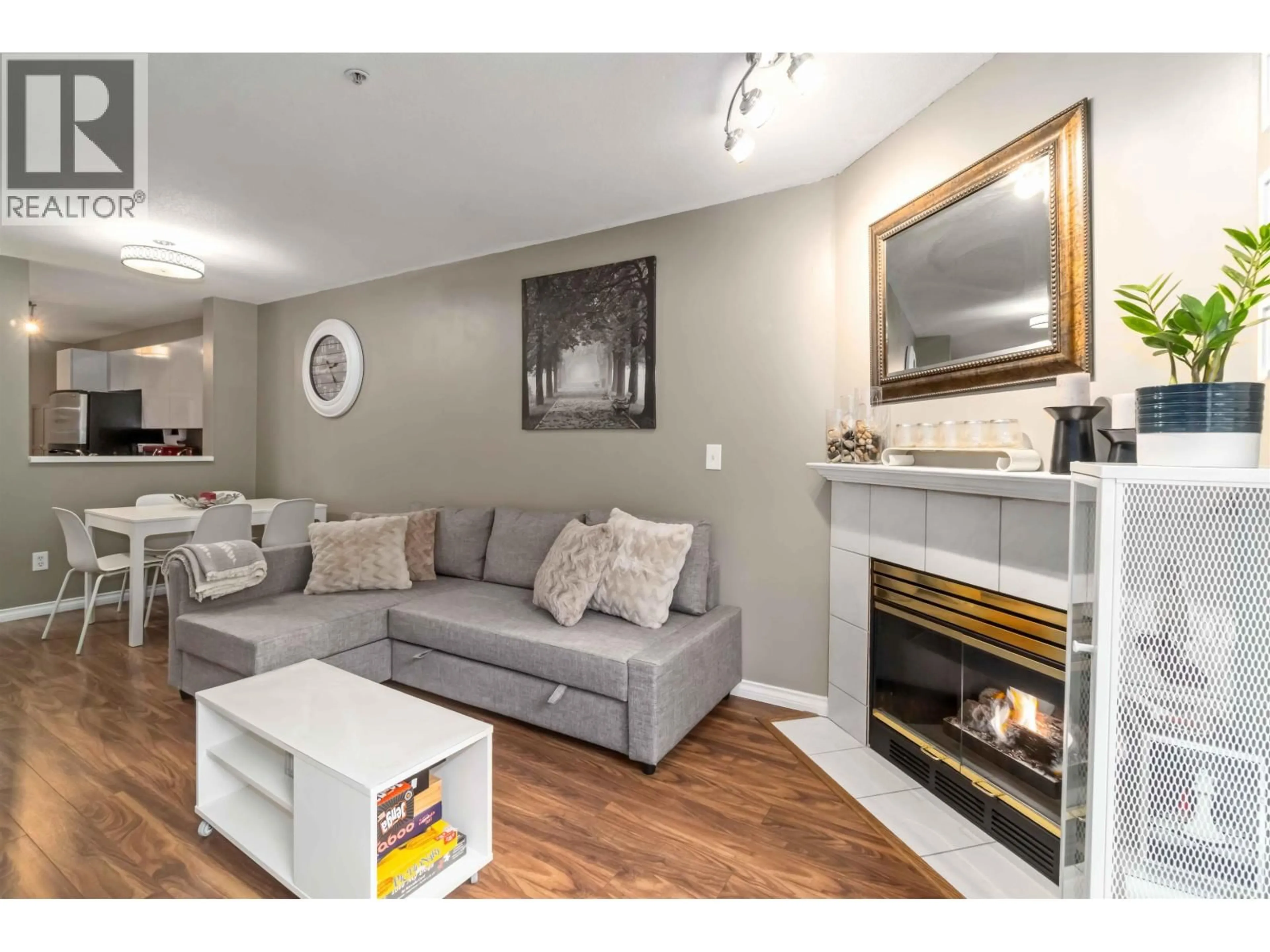 Living room with furniture, wood/laminate floor for 105 - 509 CARNARVON STREET, New Westminster British Columbia V3L5S4