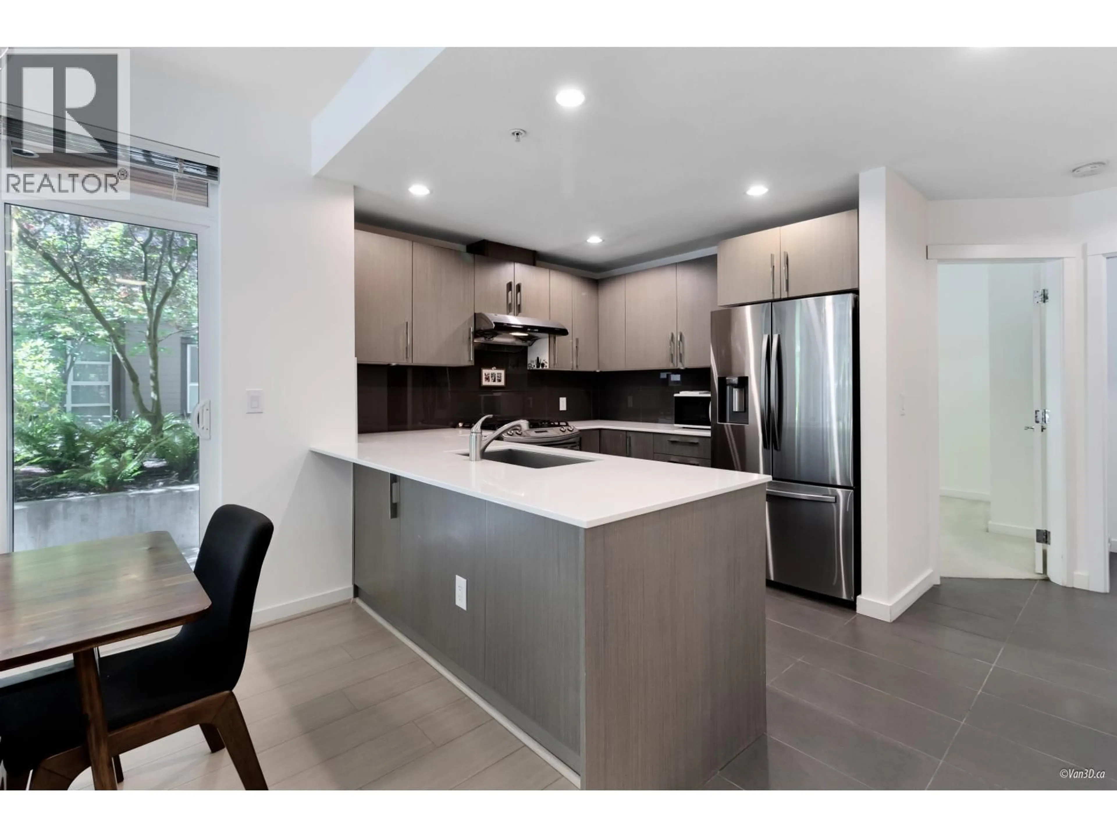 Open concept kitchen, ceramic/tile floor for 116 - 3479 WESBROOK MALL, Vancouver British Columbia V6S0B7