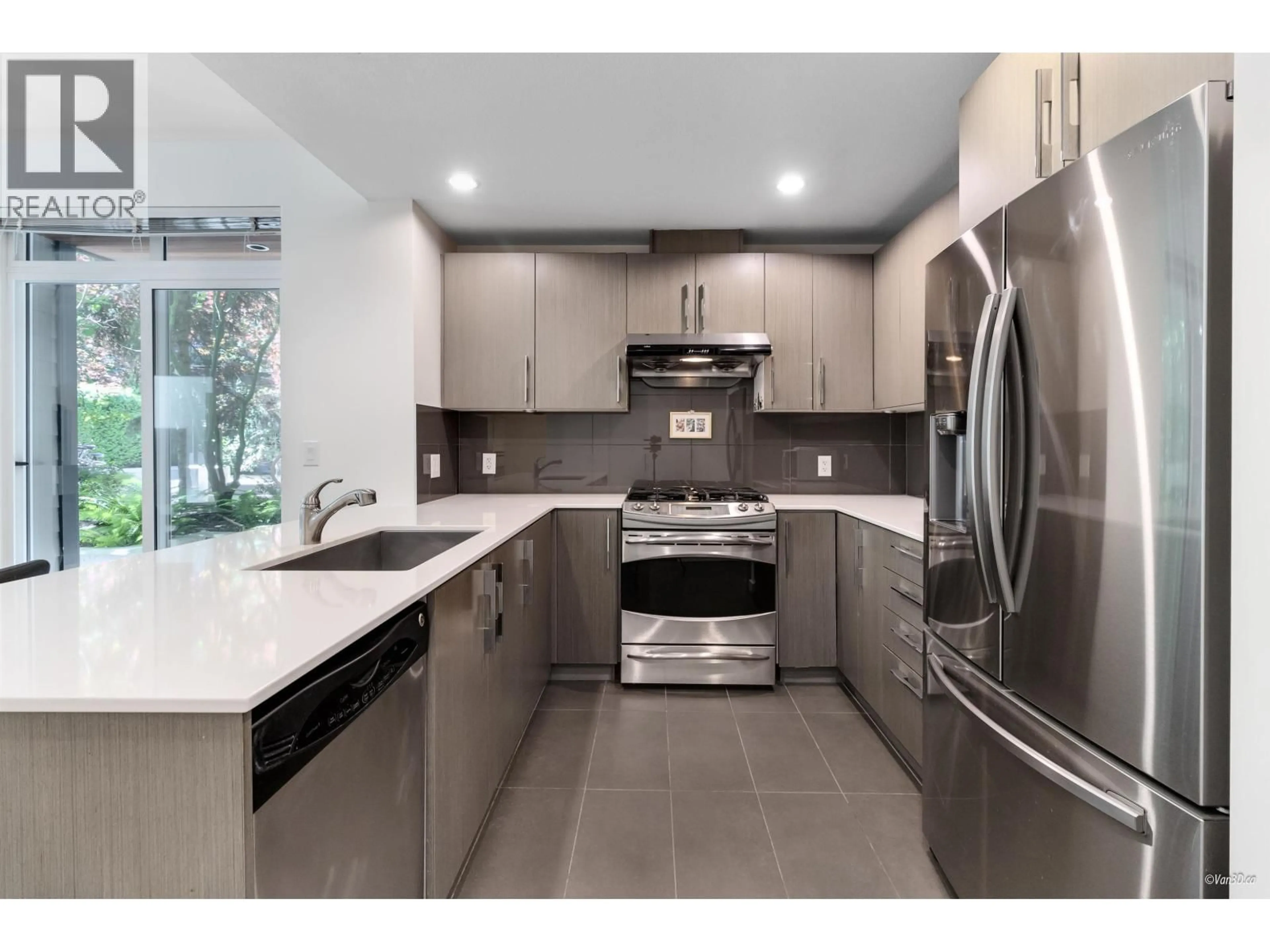 Open concept kitchen, ceramic/tile floor for 116 - 3479 WESBROOK MALL, Vancouver British Columbia V6S0B7