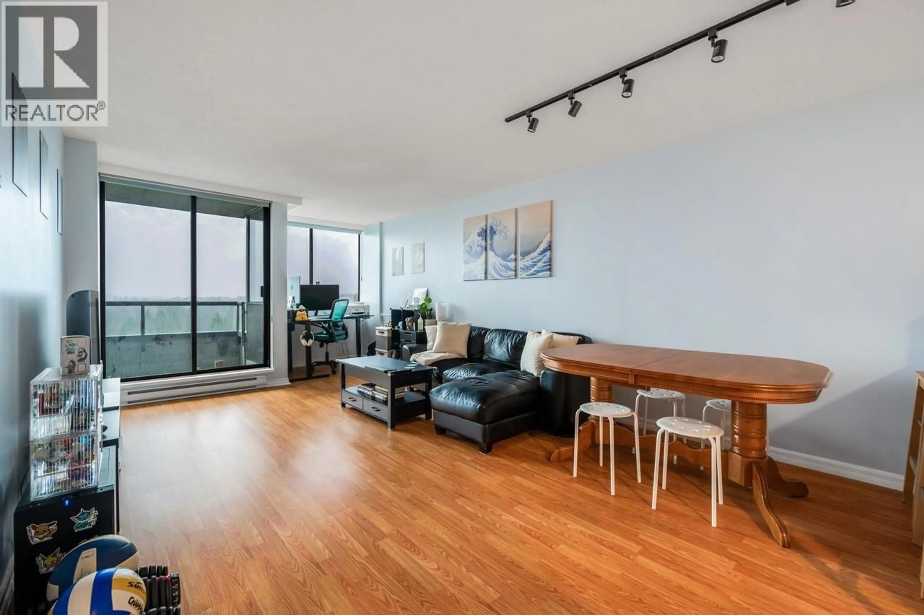 Living room with furniture, wood/laminate floor for 1205 - 3970 CARRIGAN COURT, Burnaby British Columbia V3N4S5