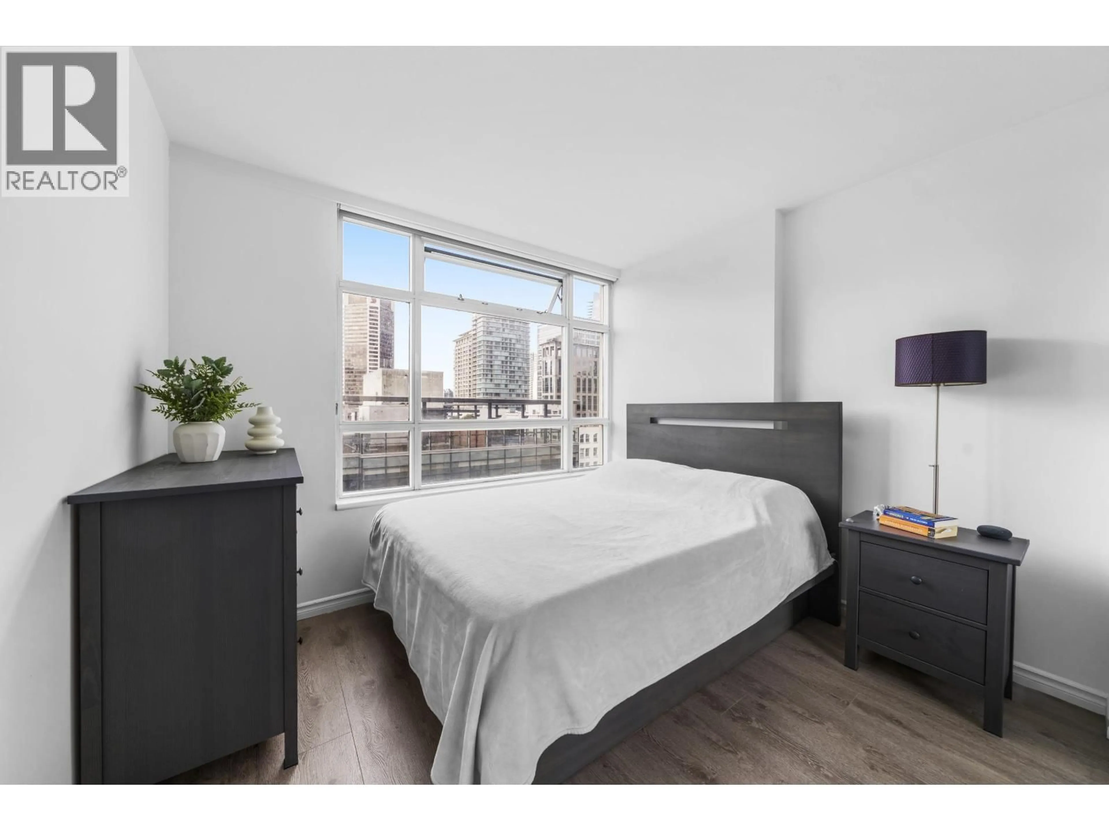 Bedroom with bed, wood/laminate floor for 1709 - 438 SEYMOUR STREET, Vancouver British Columbia V6B6H4