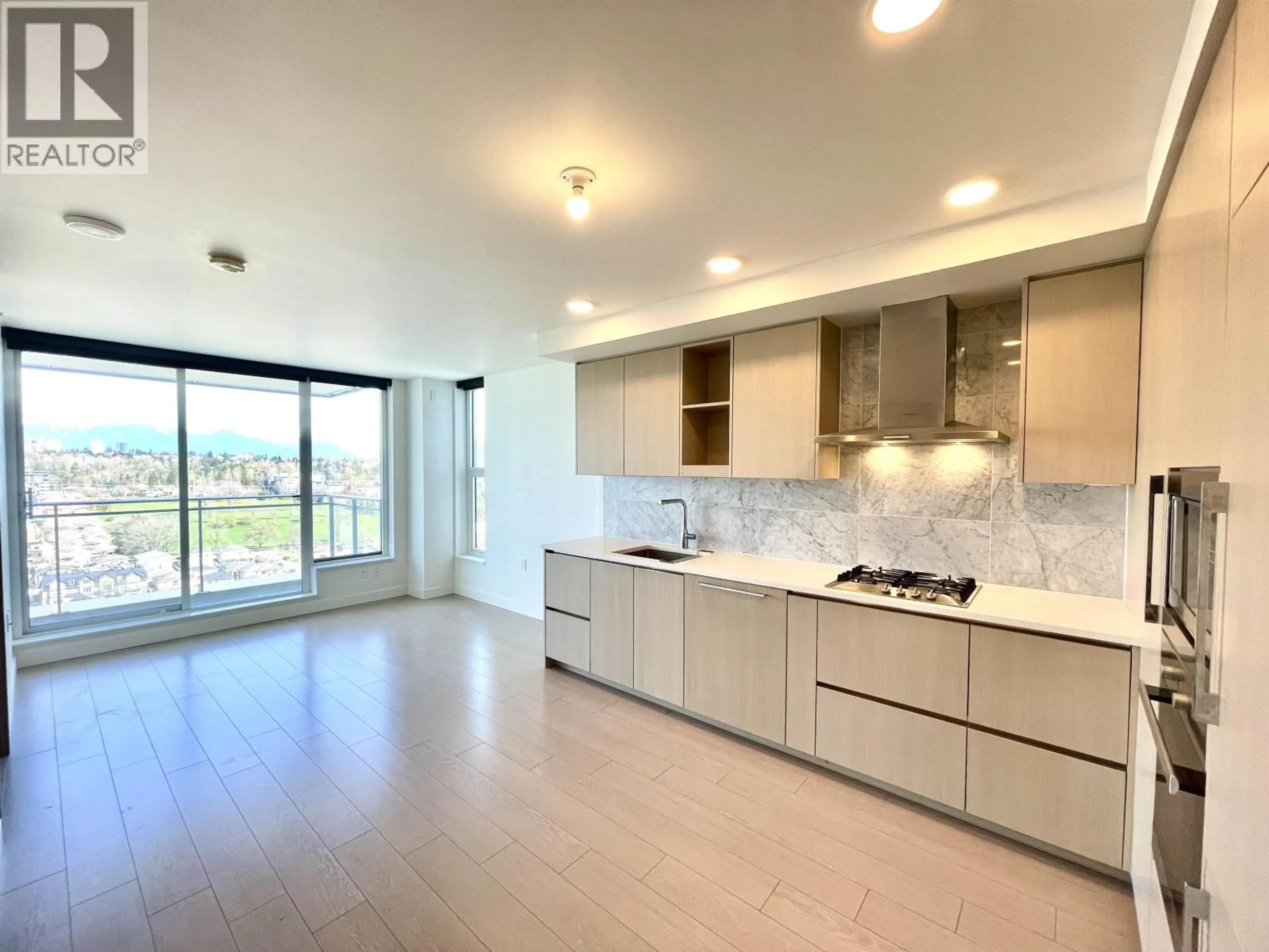 Open concept kitchen, ceramic/tile floor for 2708 - 455 MARINE DRIVE, Vancouver British Columbia V5X0H3
