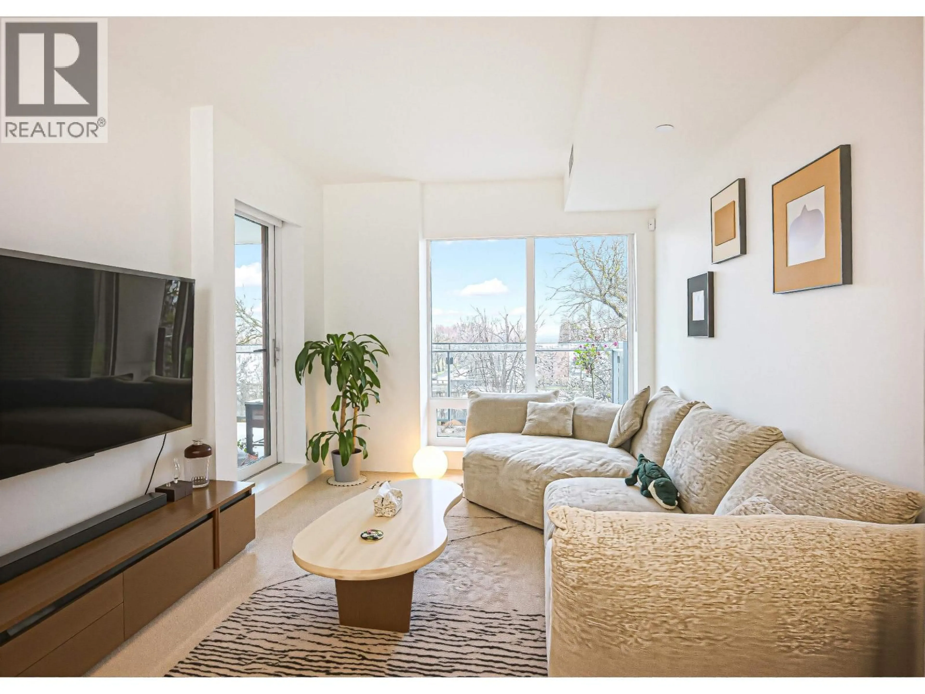 Living room with furniture, wood/laminate floor for 303 - 6833 PEARSON WAY, Richmond British Columbia V7C0E8