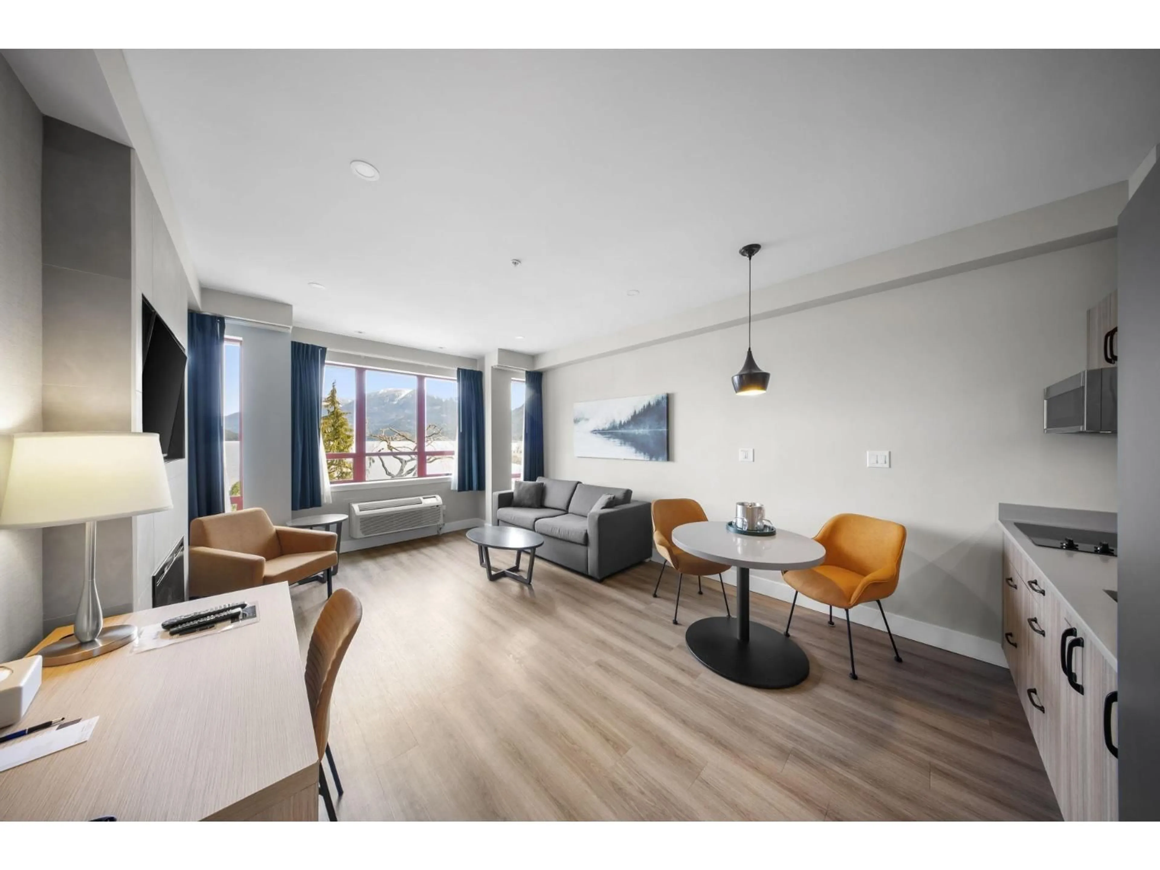 Living room with furniture, wood/laminate floor for 312A - 160 ESPLANADE AVENUE, Harrison Hot Springs British Columbia V0M1K0