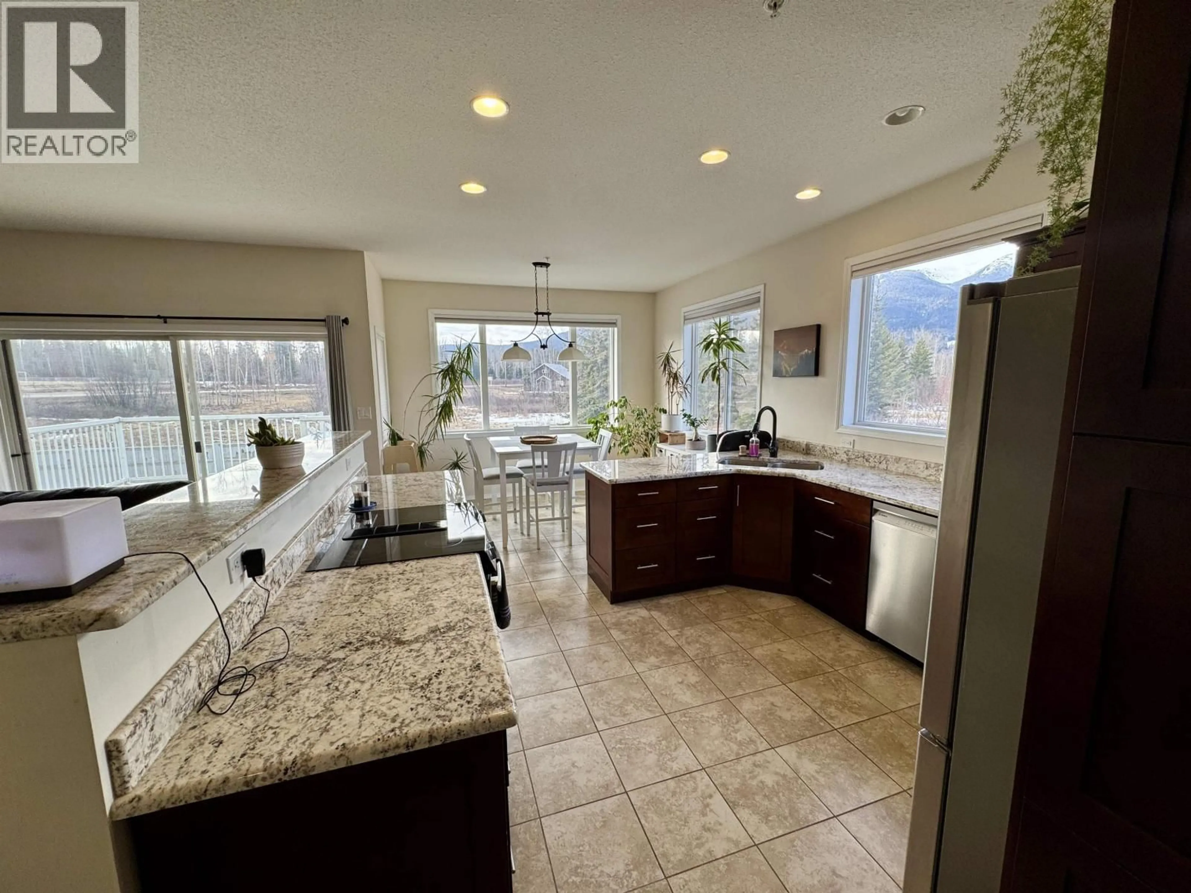 Open concept kitchen, ceramic/tile floor for 29 STARLITER WAY, Smithers British Columbia V0J2N2