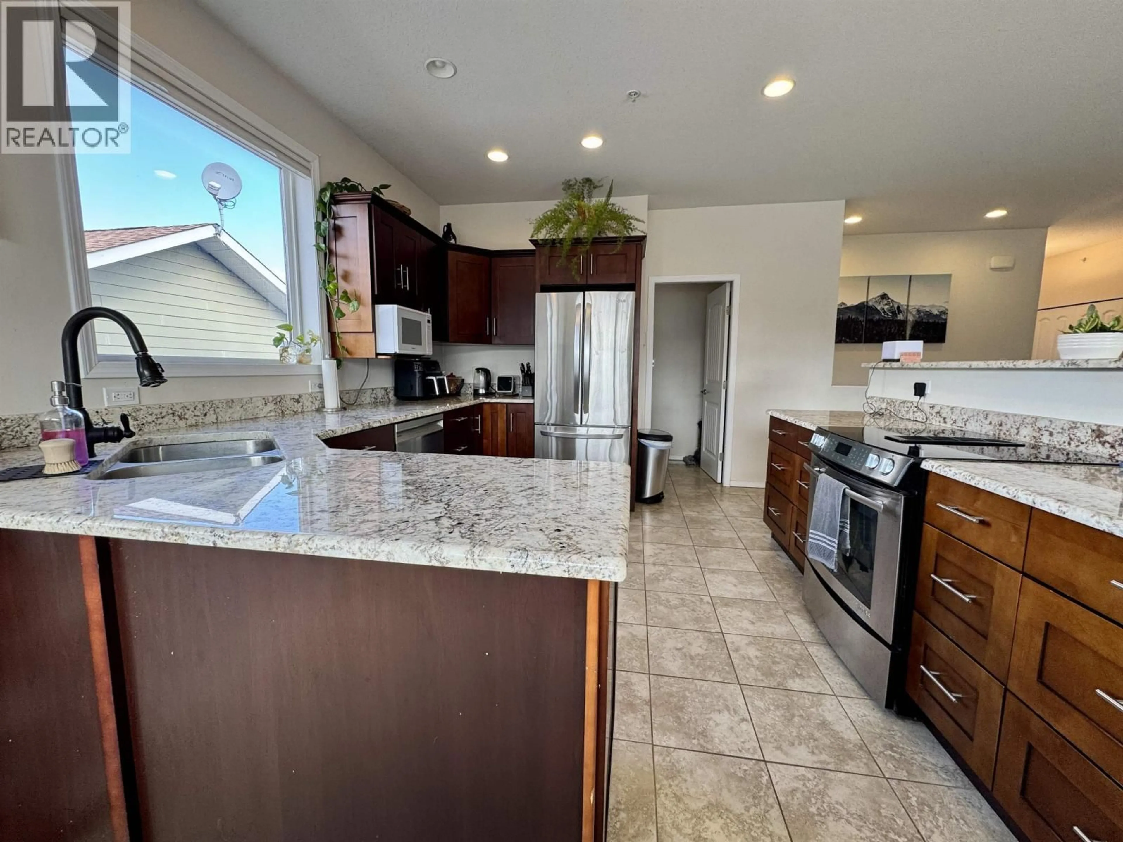 Open concept kitchen, ceramic/tile floor for 29 STARLITER WAY, Smithers British Columbia V0J2N2