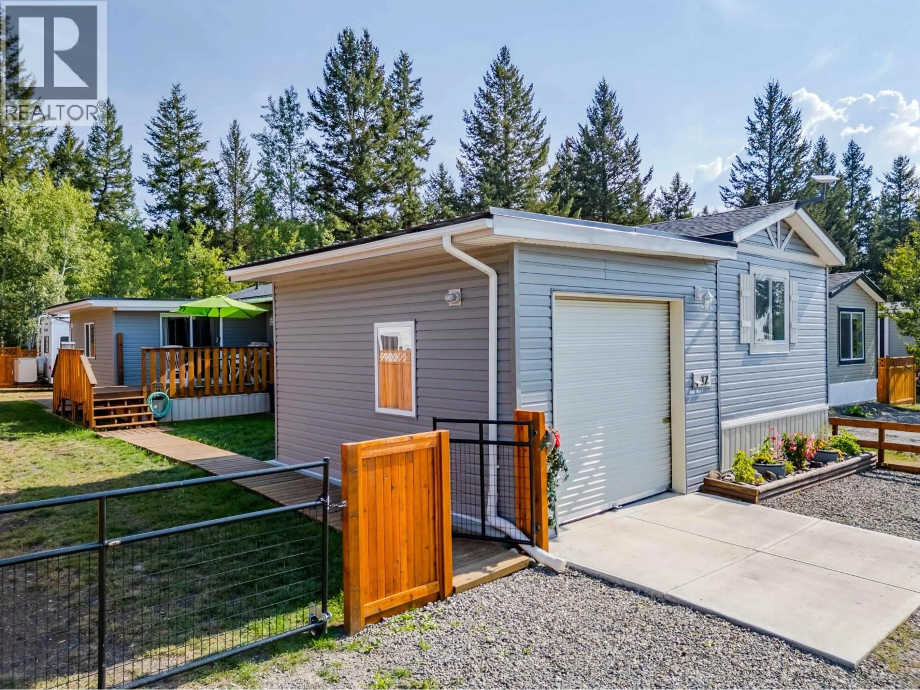 Home with vinyl exterior material, street for 12 - 4072 LAC LA HACHE STATION ROAD, Lac La Hache British Columbia V0K1T1