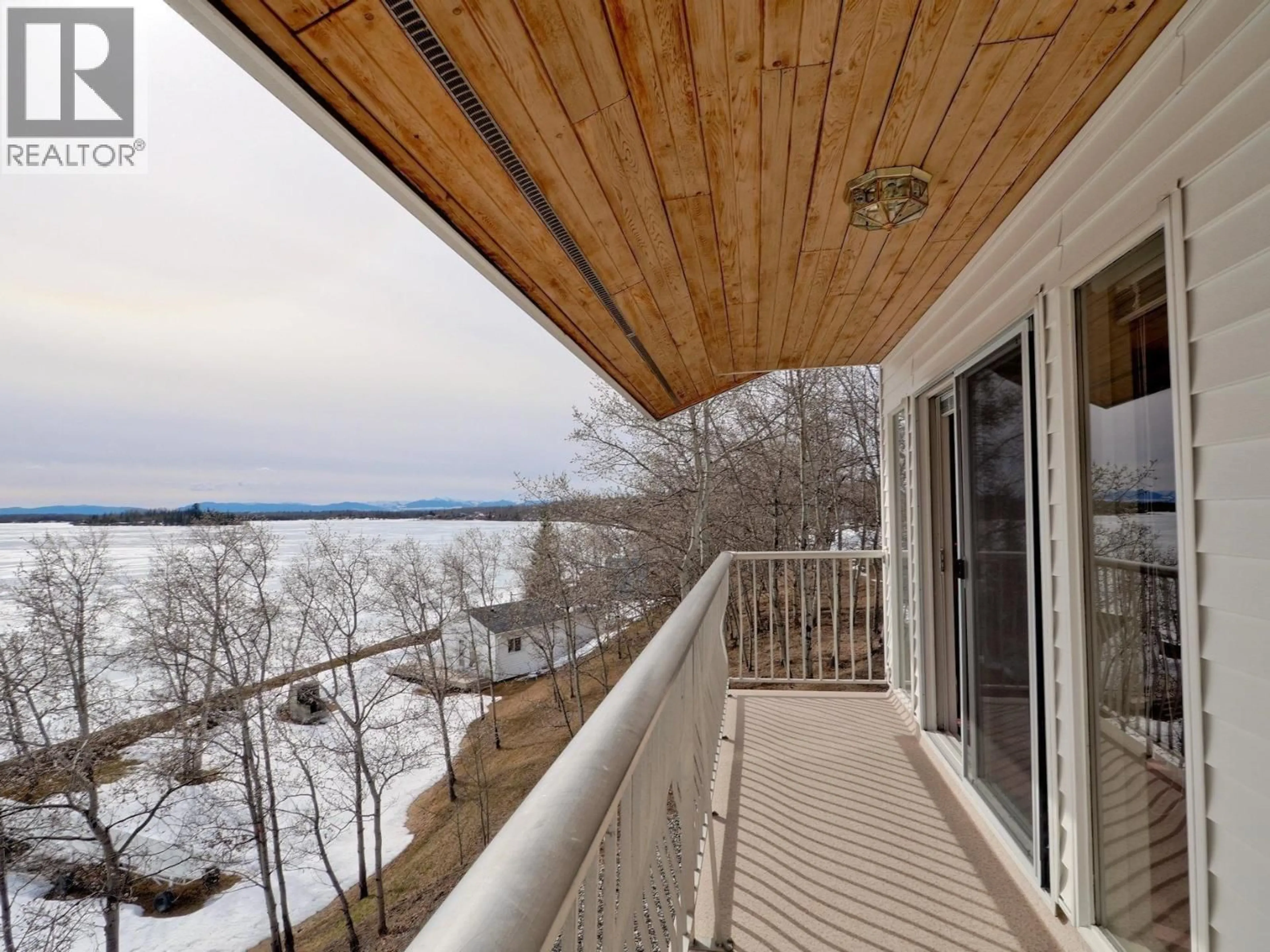 Balcony in the apartment, water/lake/river/ocean view for 5664 GREEN LAKE NORTH ROAD, 100 Mile House British Columbia V0K2K1