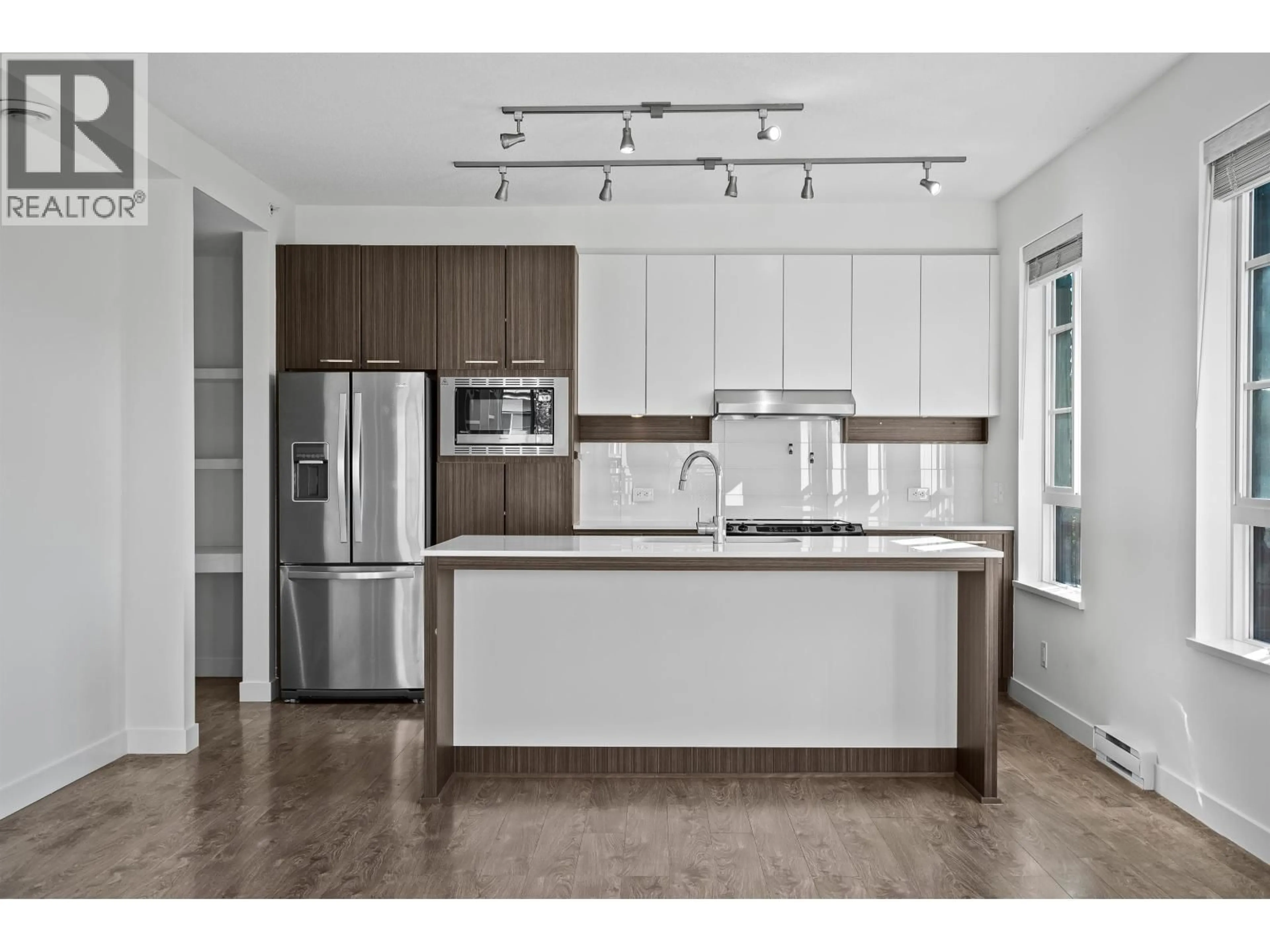 Open concept kitchen, wood/laminate floor for 301 - 553 FOSTER AVENUE, Coquitlam British Columbia V3J0B5