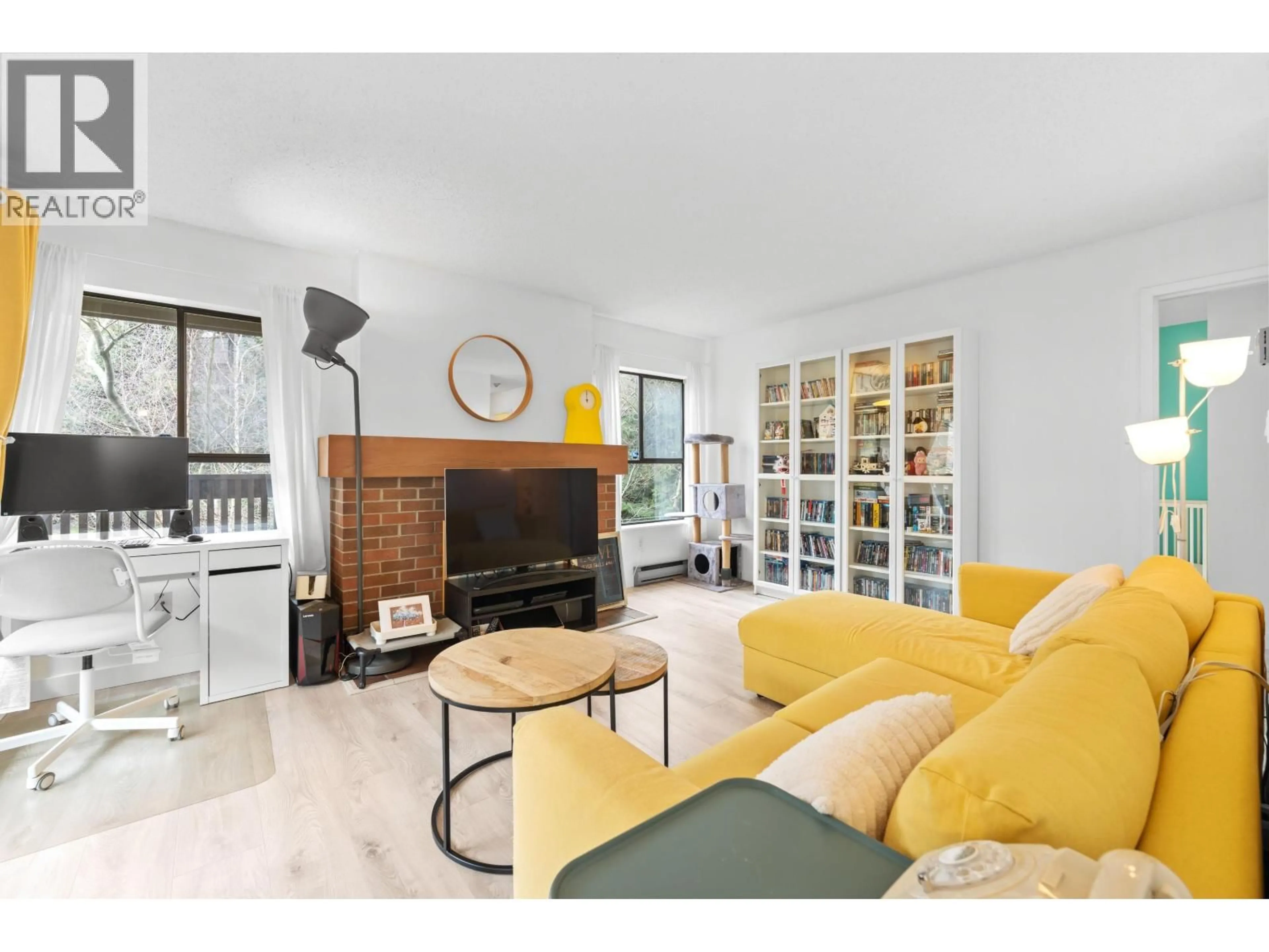 Living room with furniture, wood/laminate floor for 125 - 7431 MINORU BOULEVARD, Richmond British Columbia V6Y1Z3