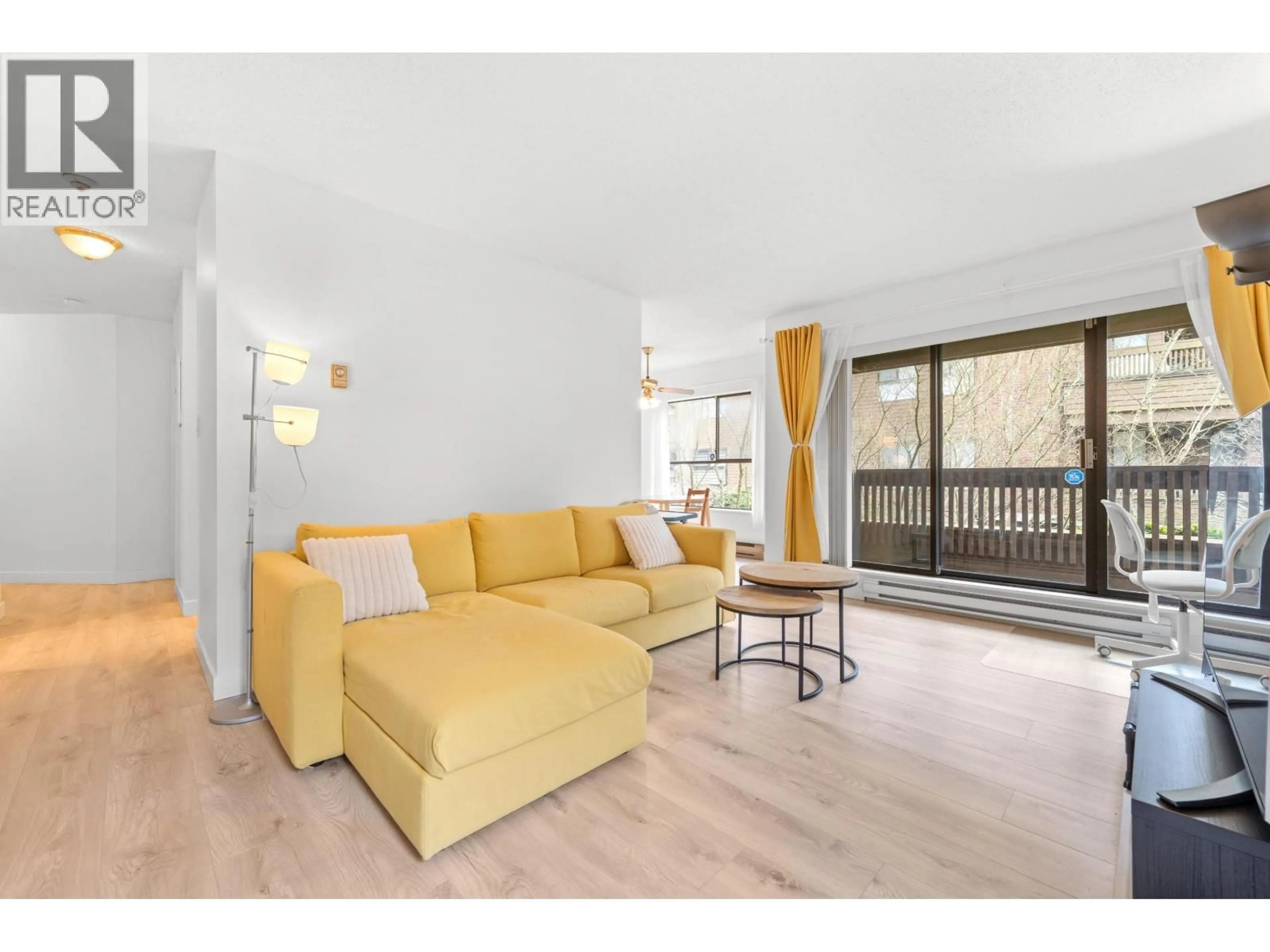 Living room with furniture, wood/laminate floor for 125 - 7431 MINORU BOULEVARD, Richmond British Columbia V6Y1Z3