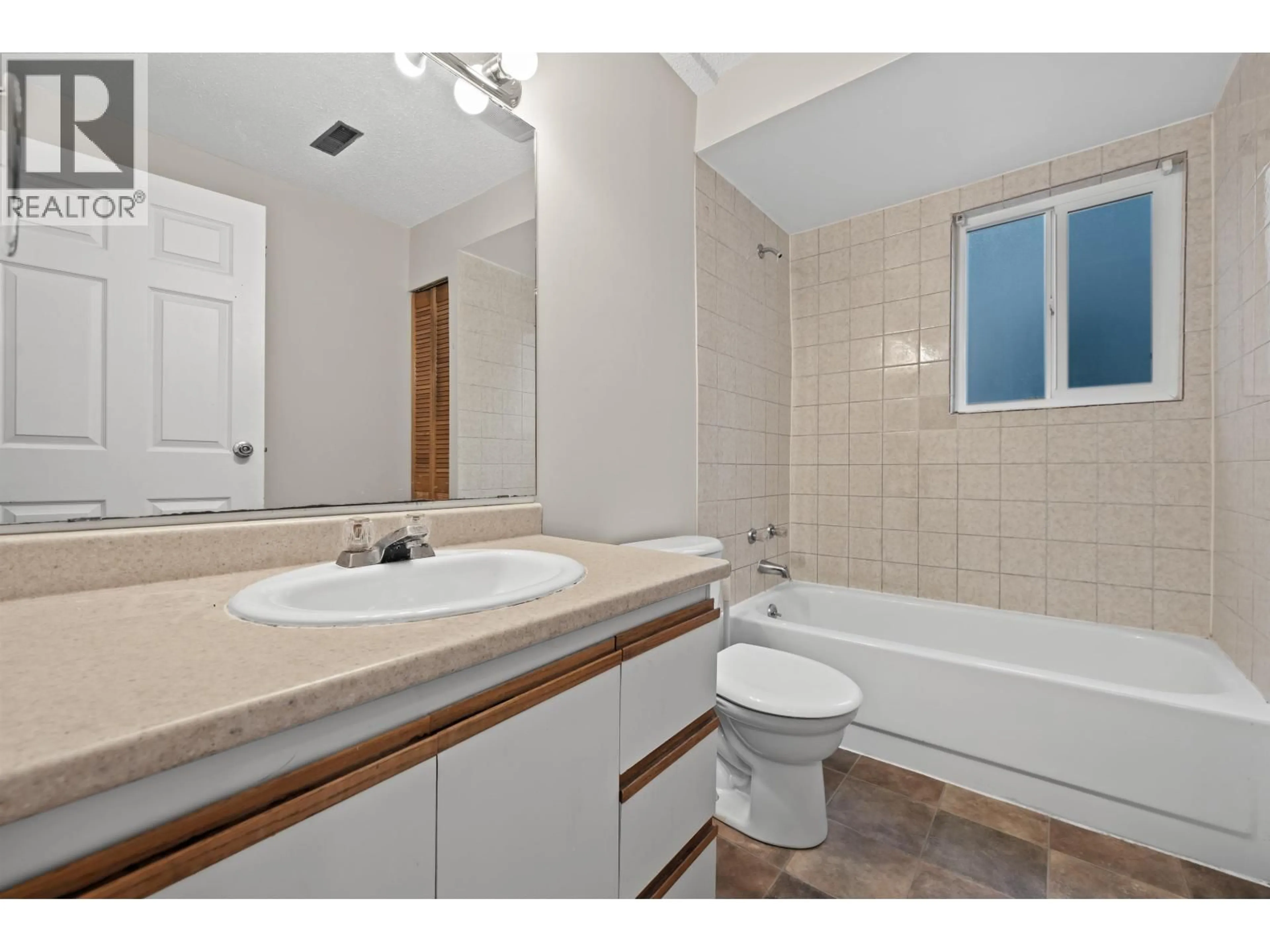 Standard bathroom, ceramic/tile floor for 4125 LYNN VALLEY ROAD, North Vancouver British Columbia V7K2T1