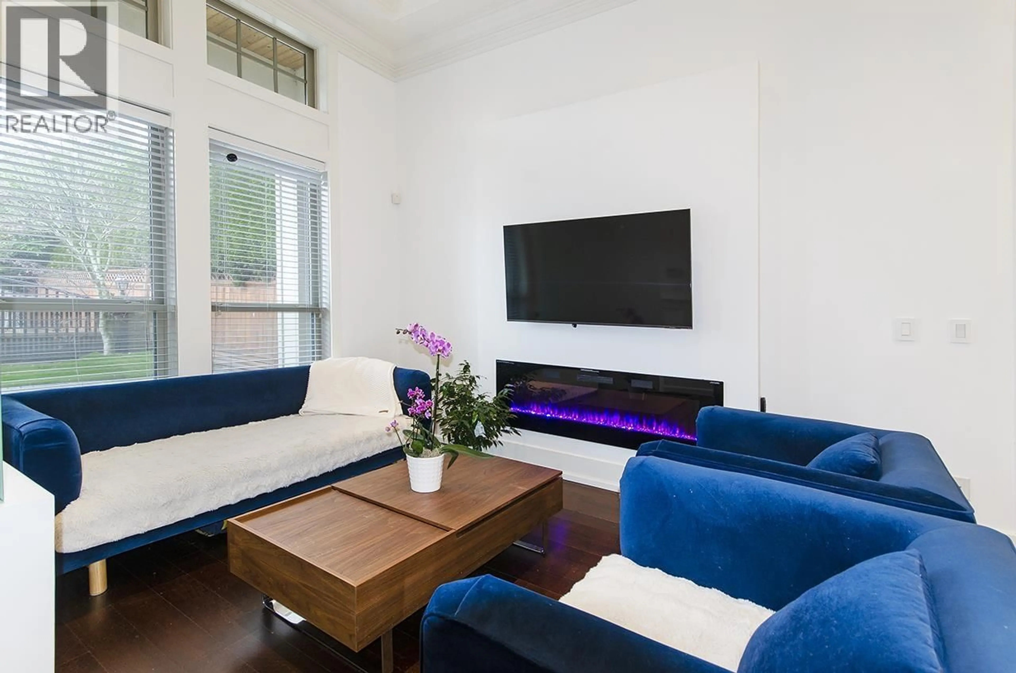 Living room with furniture, wood/laminate floor for 7682 ARMSTRONG STREET, Richmond British Columbia V6Y0C5