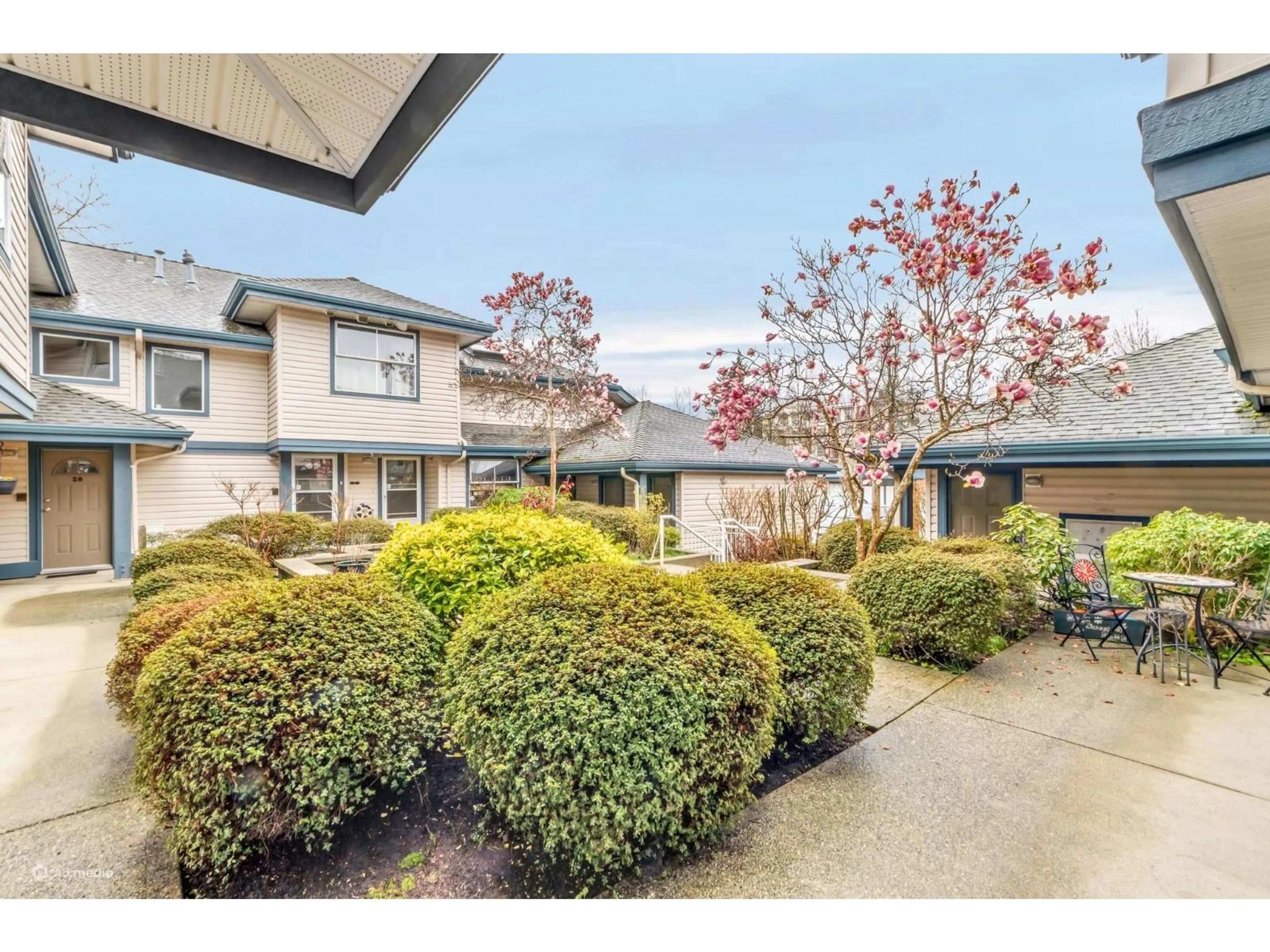 A pic from outside/outdoor area/front of a property/back of a property/a pic from drone, street for 23 - 5666 208 STREET, Langley British Columbia V3A8G4