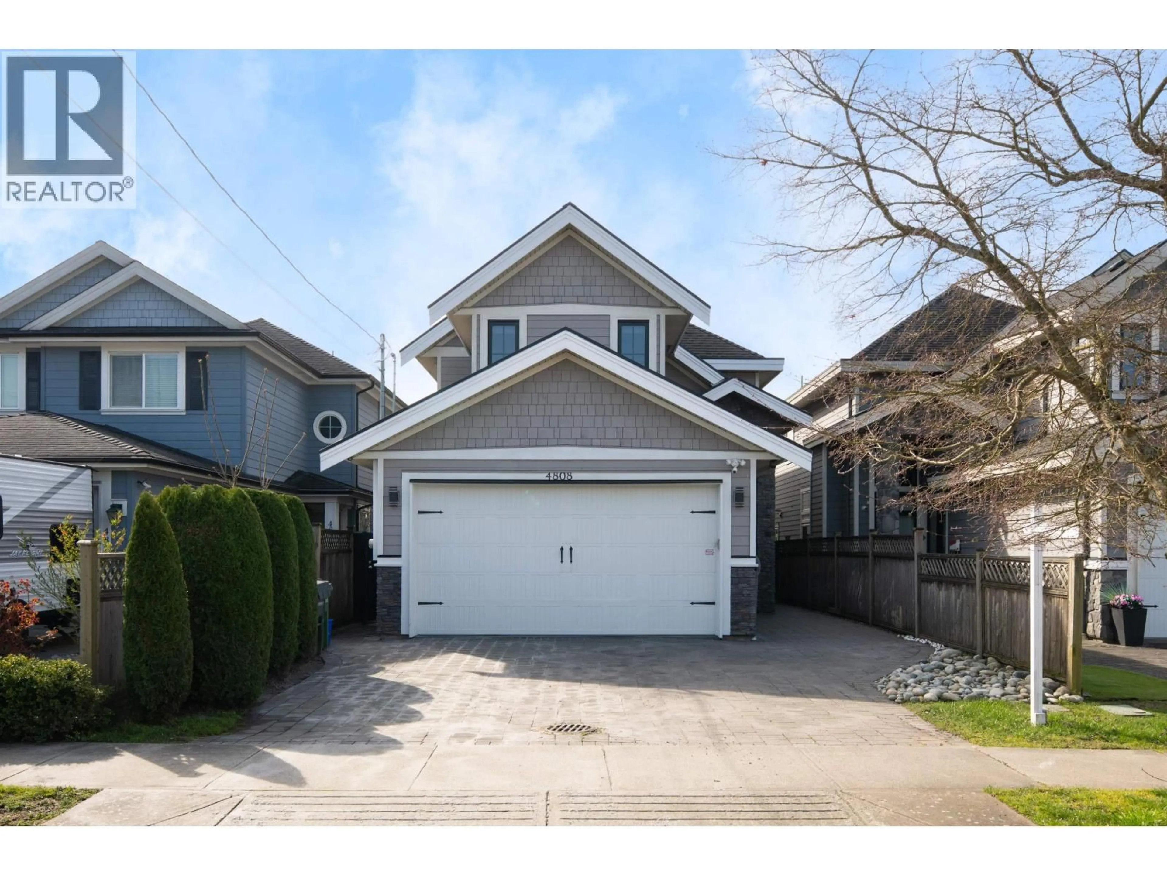 Home with vinyl exterior material, street for 4808 GARRY STREET, Richmond British Columbia V7E2V3