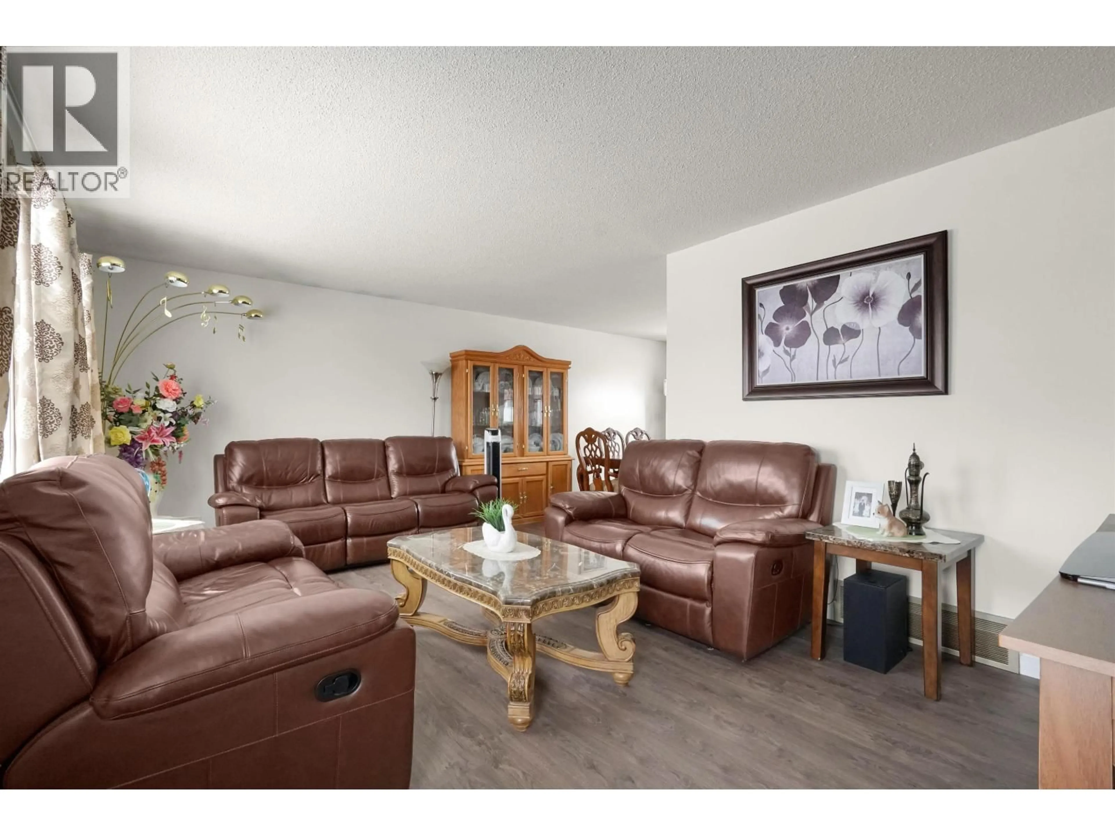 Living room with furniture, wood/laminate floor for 31 SPARKS AVENUE, Kitimat British Columbia V8C2R6