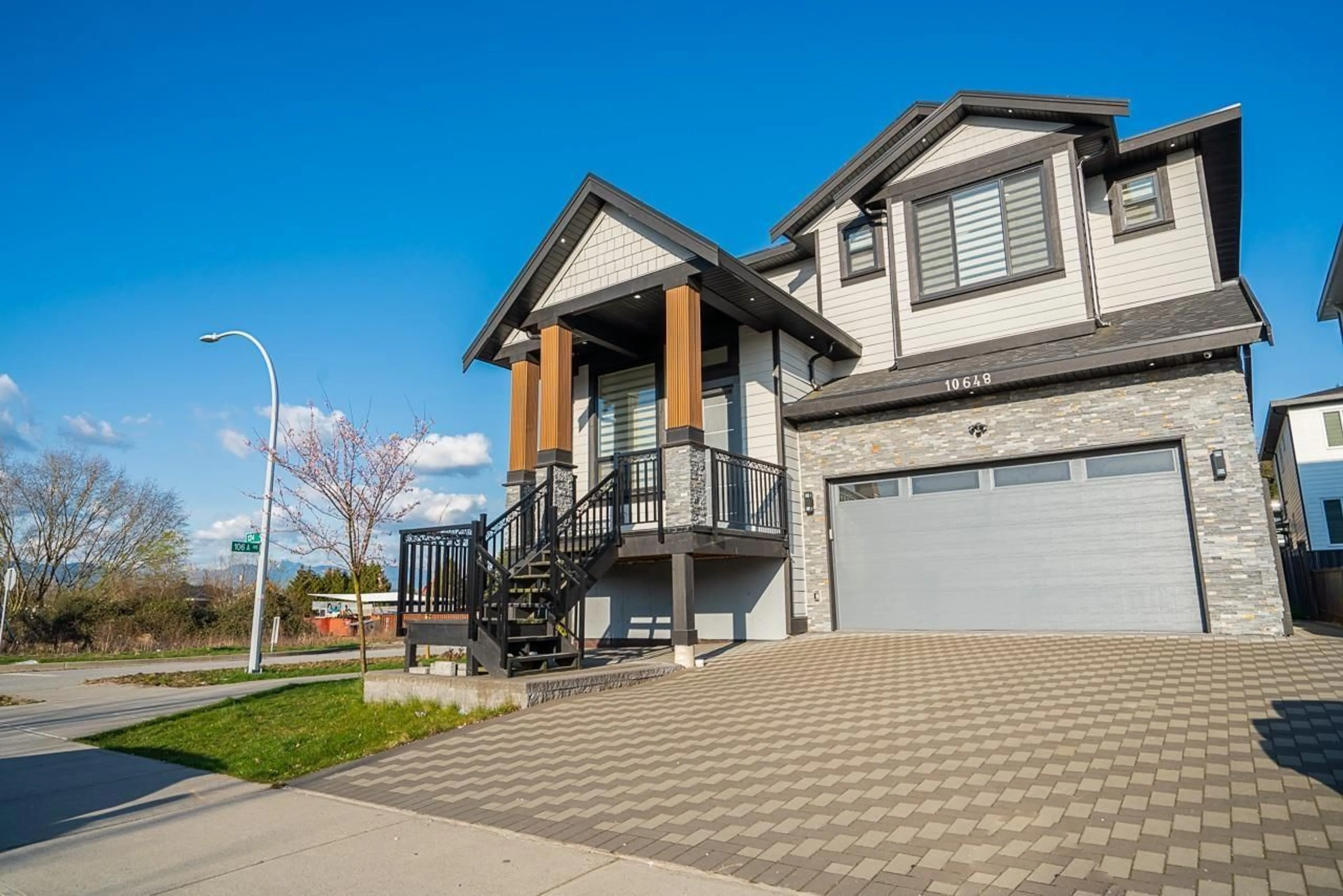 Home with vinyl exterior material, street for 10648 124 STREET, Surrey British Columbia V3V0E2