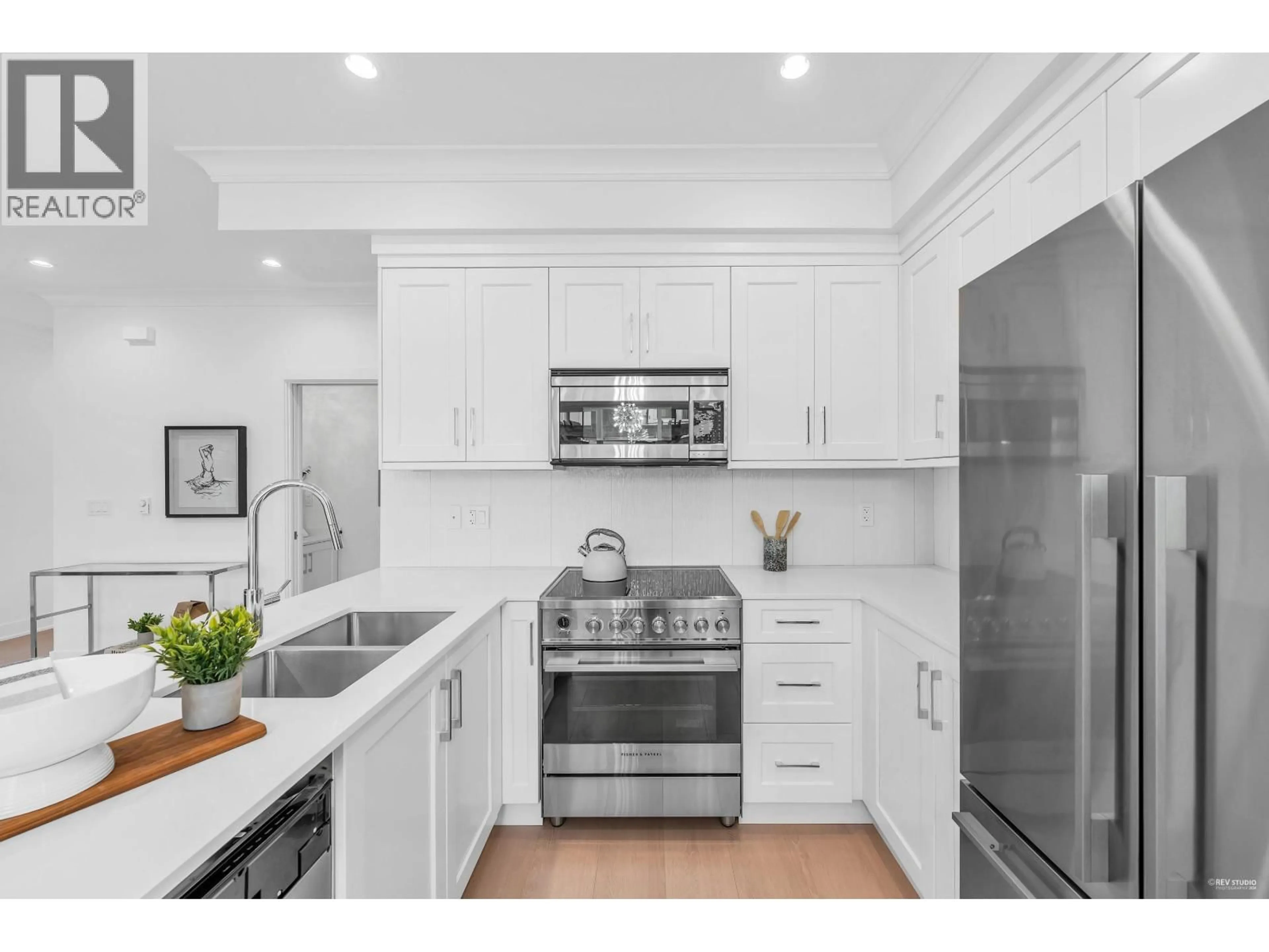 Open concept kitchen, ceramic/tile floor for 107 - 8233 WILLIAMS ROAD, Richmond British Columbia V7A1G4