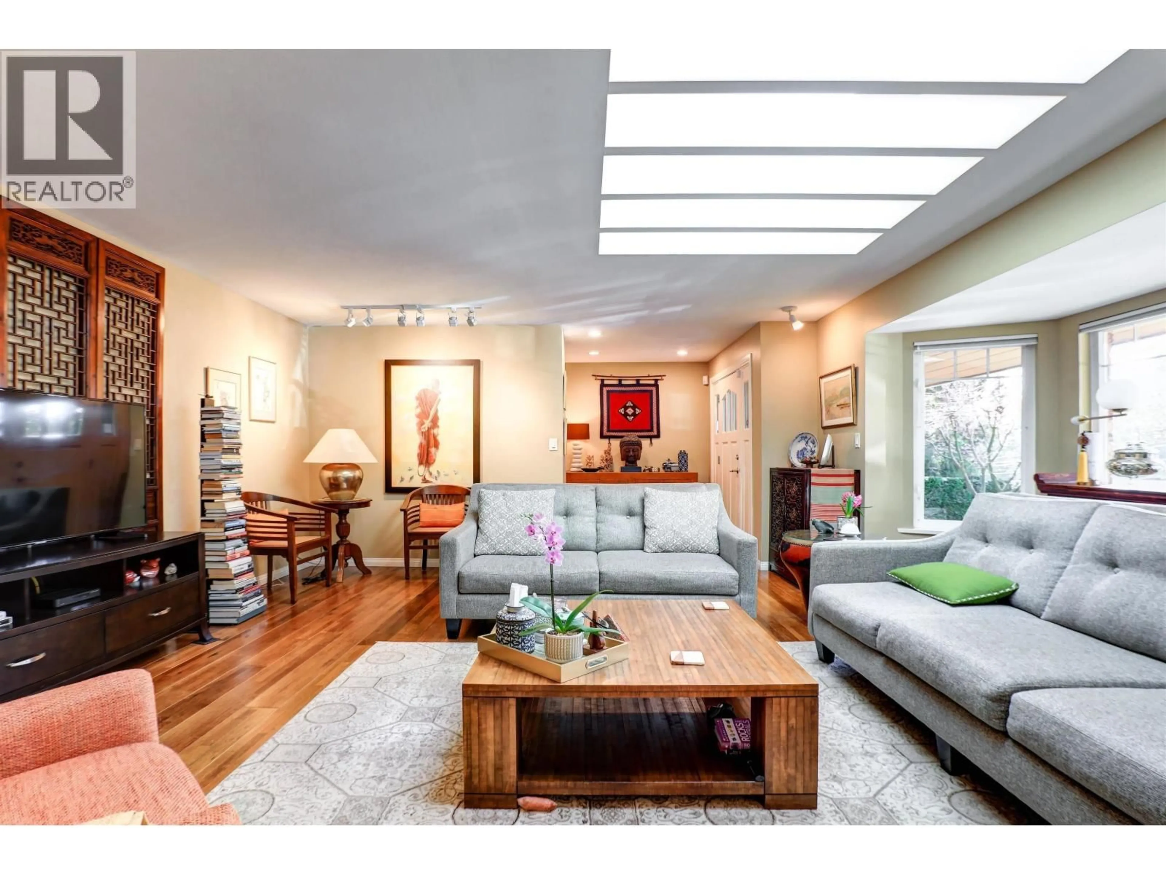 Living room with furniture, wood/laminate floor for 4730 WILLOW CREEK ROAD, West Vancouver British Columbia V7W1C4