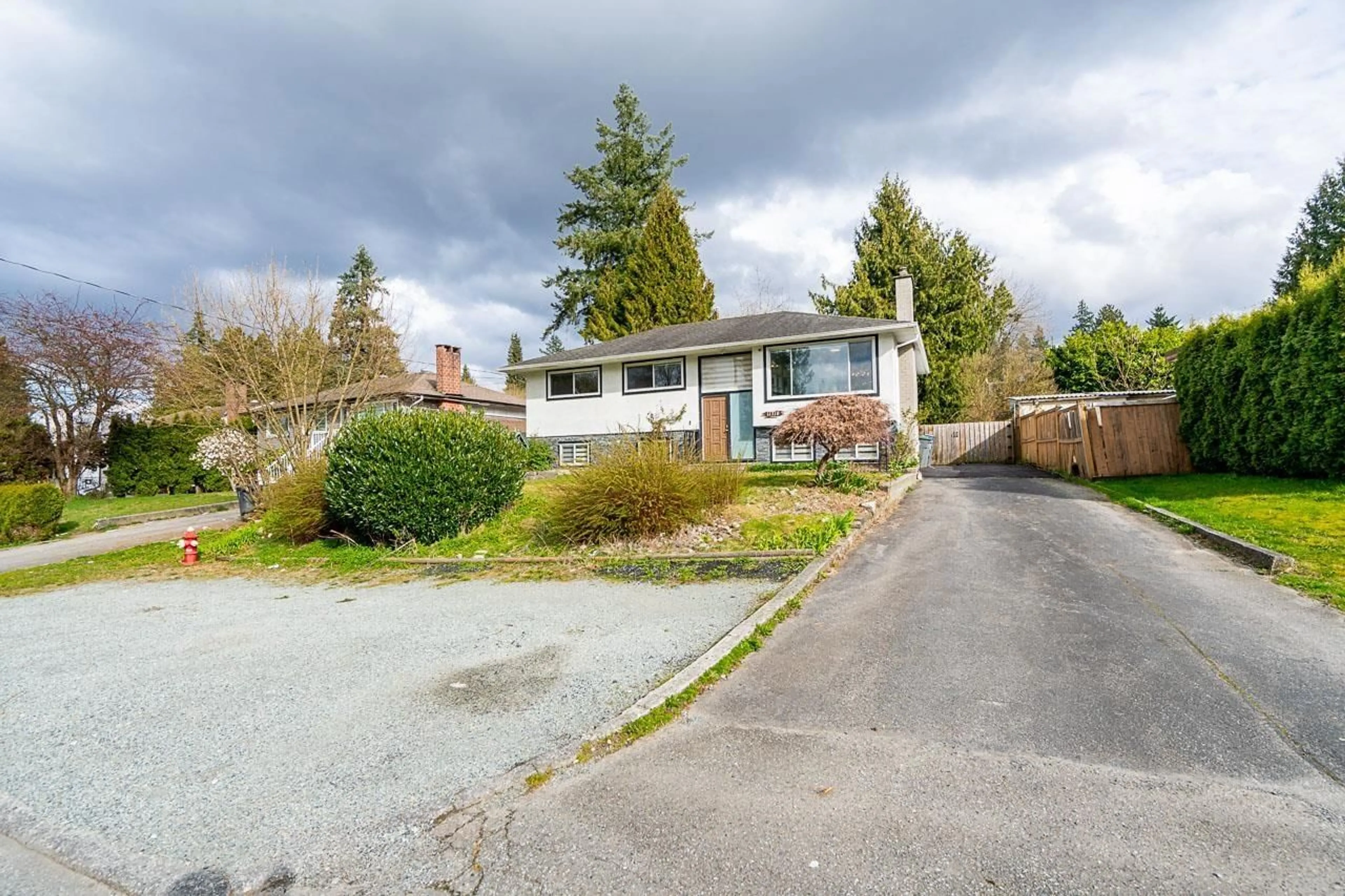 A pic from outside/outdoor area/front of a property/back of a property/a pic from drone, street for 11310 LOUGHREN DRIVE, Surrey British Columbia V3K4Z4