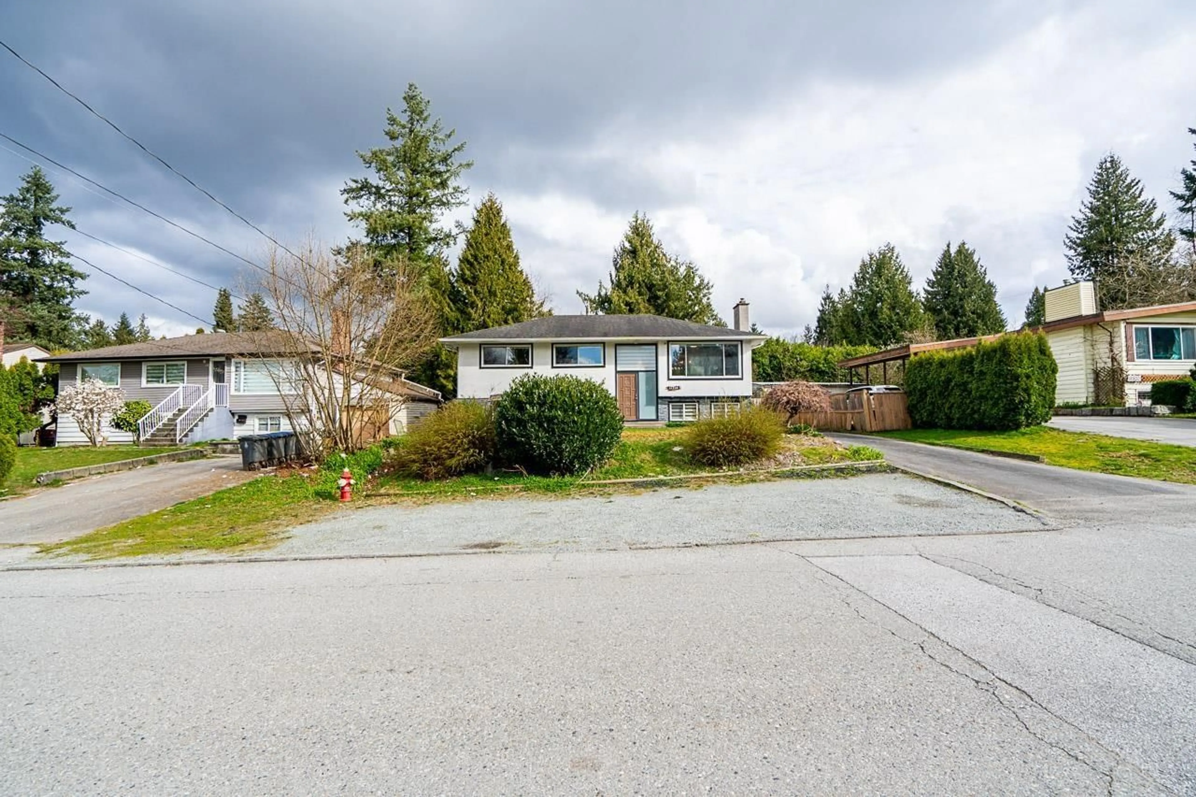 A pic from outside/outdoor area/front of a property/back of a property/a pic from drone, street for 11310 LOUGHREN DRIVE, Surrey British Columbia V3K4Z4