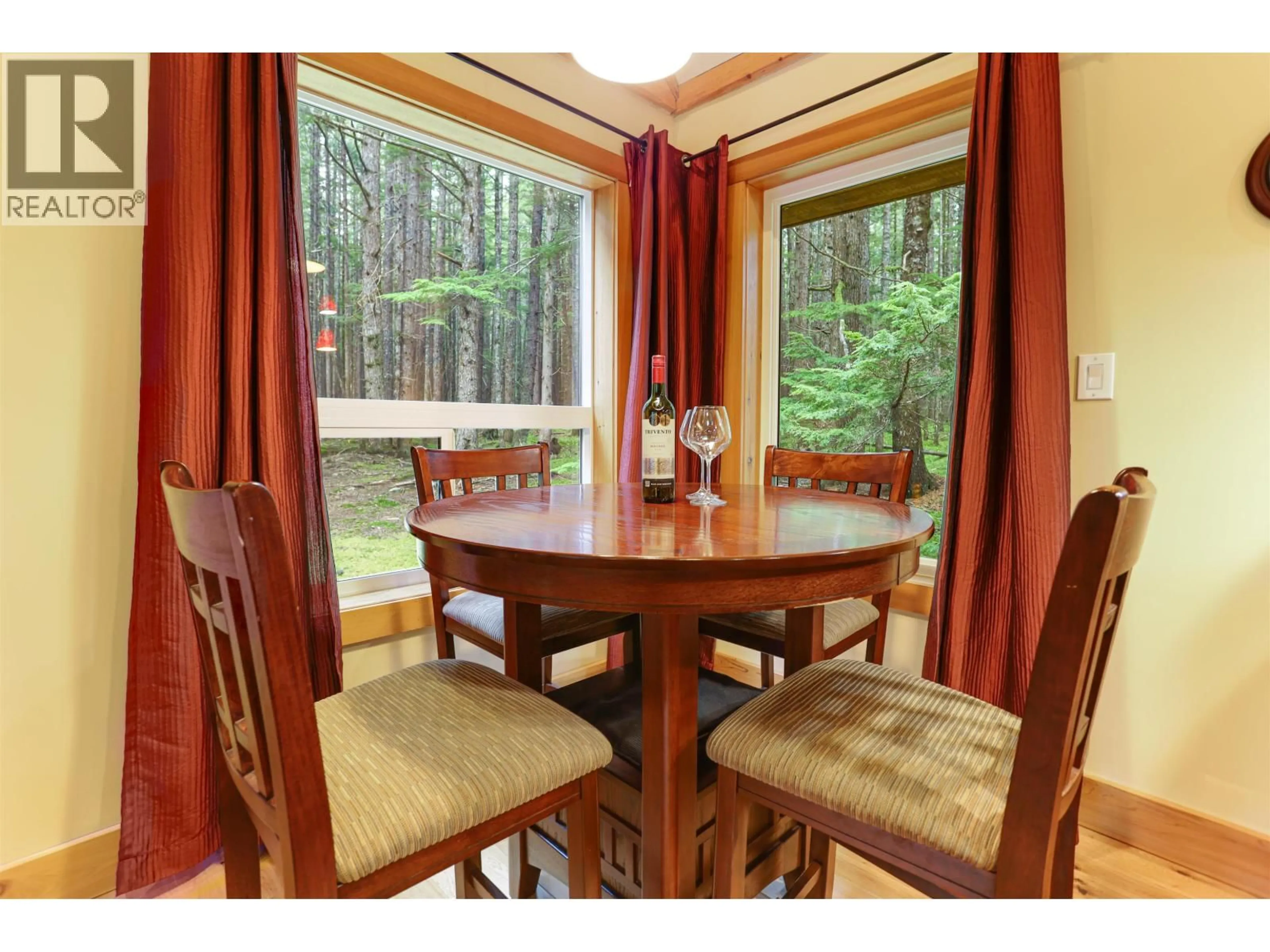Dining room, wood/laminate floor for 499 QUATSINO BOULEVARD, Kitimat British Columbia V8C0A1
