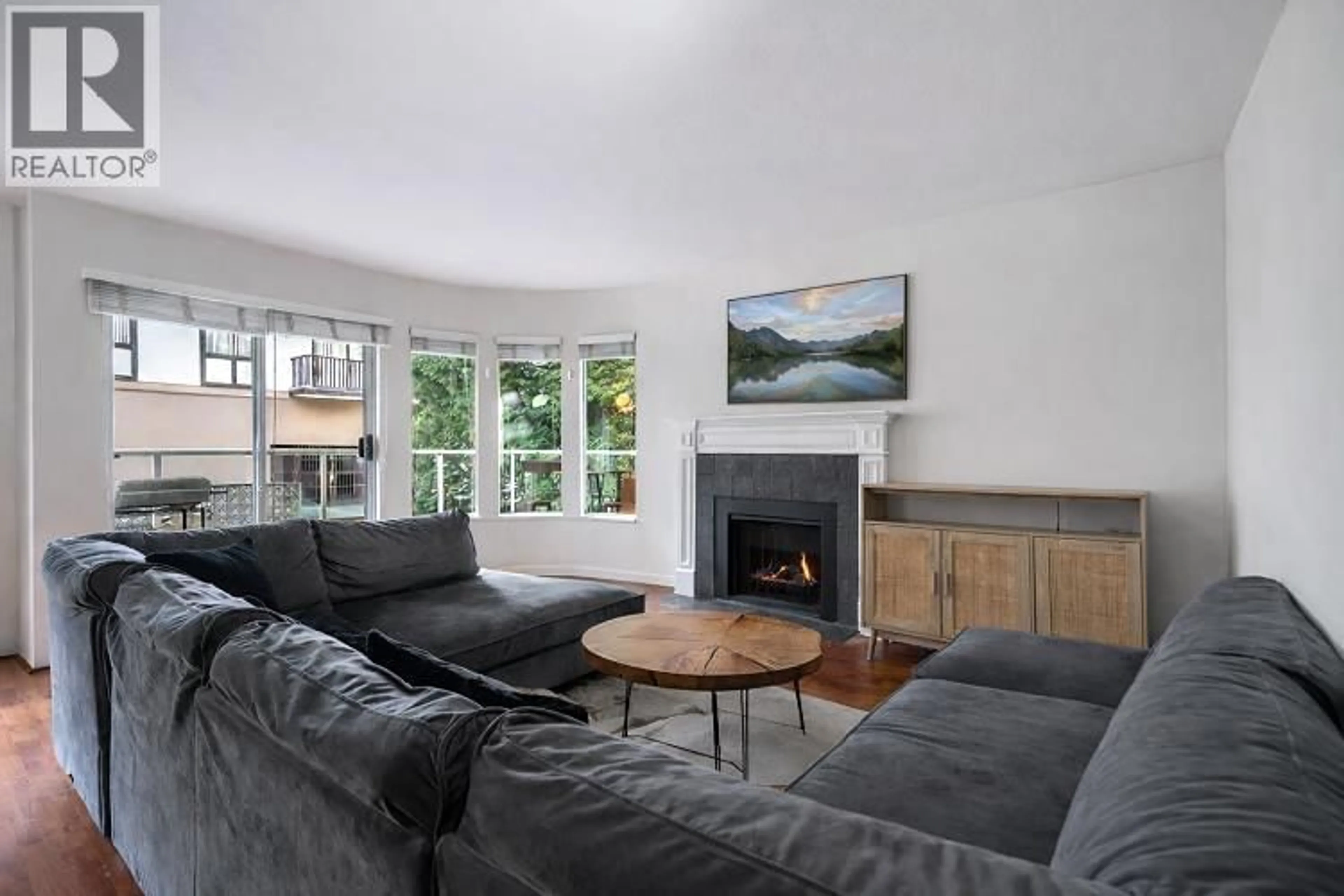 Living room with furniture, unknown for 202 - 320 2ND STREET, North Vancouver British Columbia V7M1E1