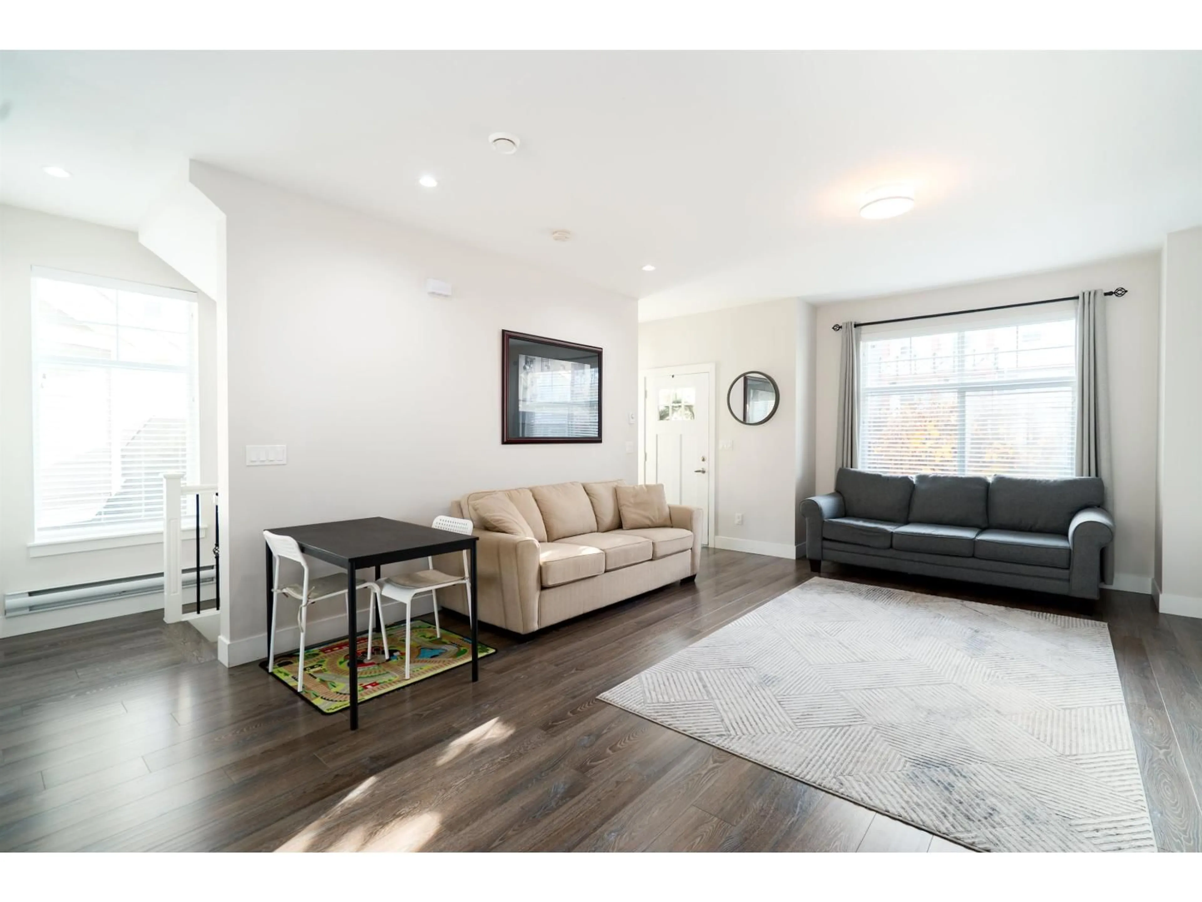 Living room with furniture, wood/laminate floor for 57 - 14541 WINTER CRESCENT, Surrey British Columbia V4P0G5