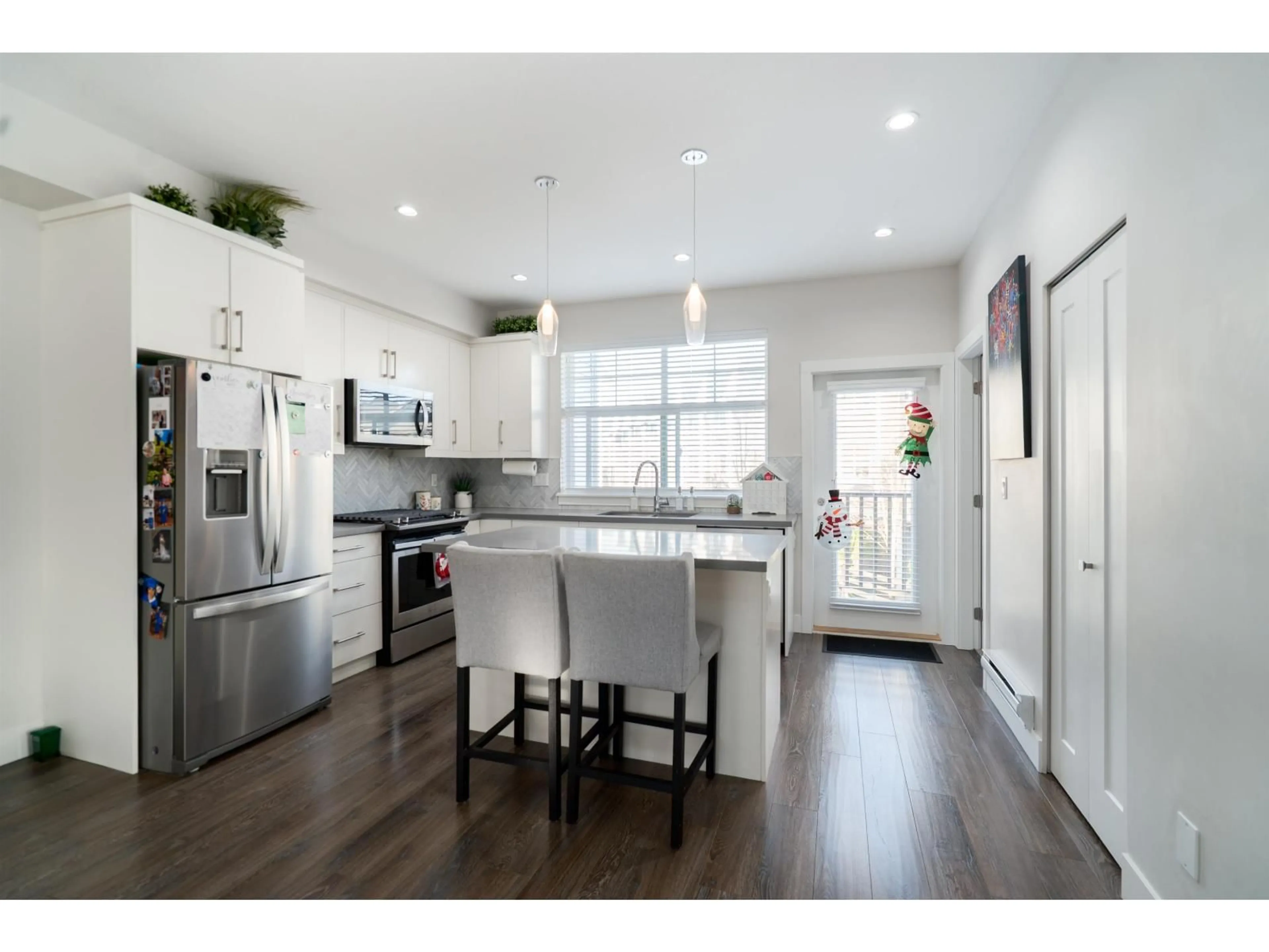 Open concept kitchen, wood/laminate floor for 57 - 14541 WINTER CRESCENT, Surrey British Columbia V4P0G5