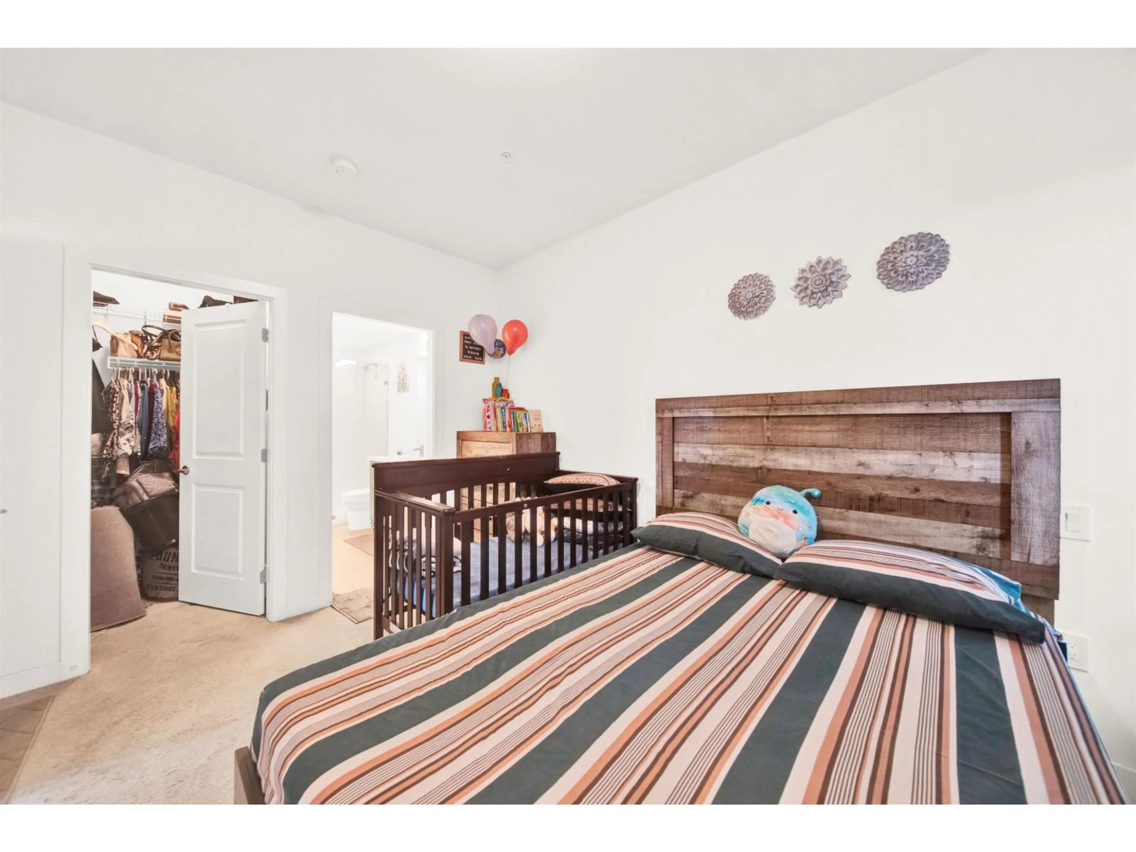 Bedroom with bed, wood/laminate floor for B208 - 20834 80 AVENUE, Langley British Columbia V2Y3M5