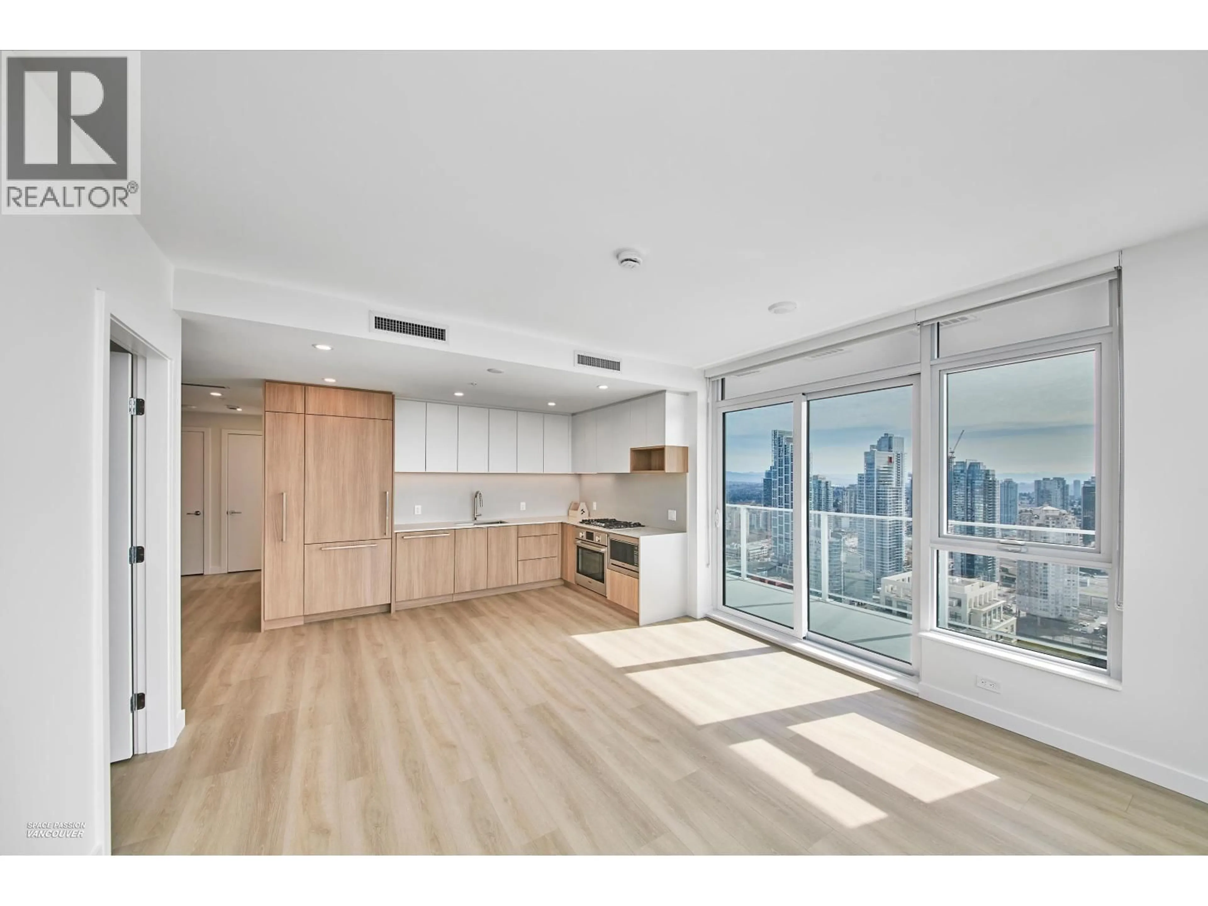 Open concept kitchen, wood/laminate floor for 3706 - 6087 WILSON AVENUE, Burnaby British Columbia V5H0M1