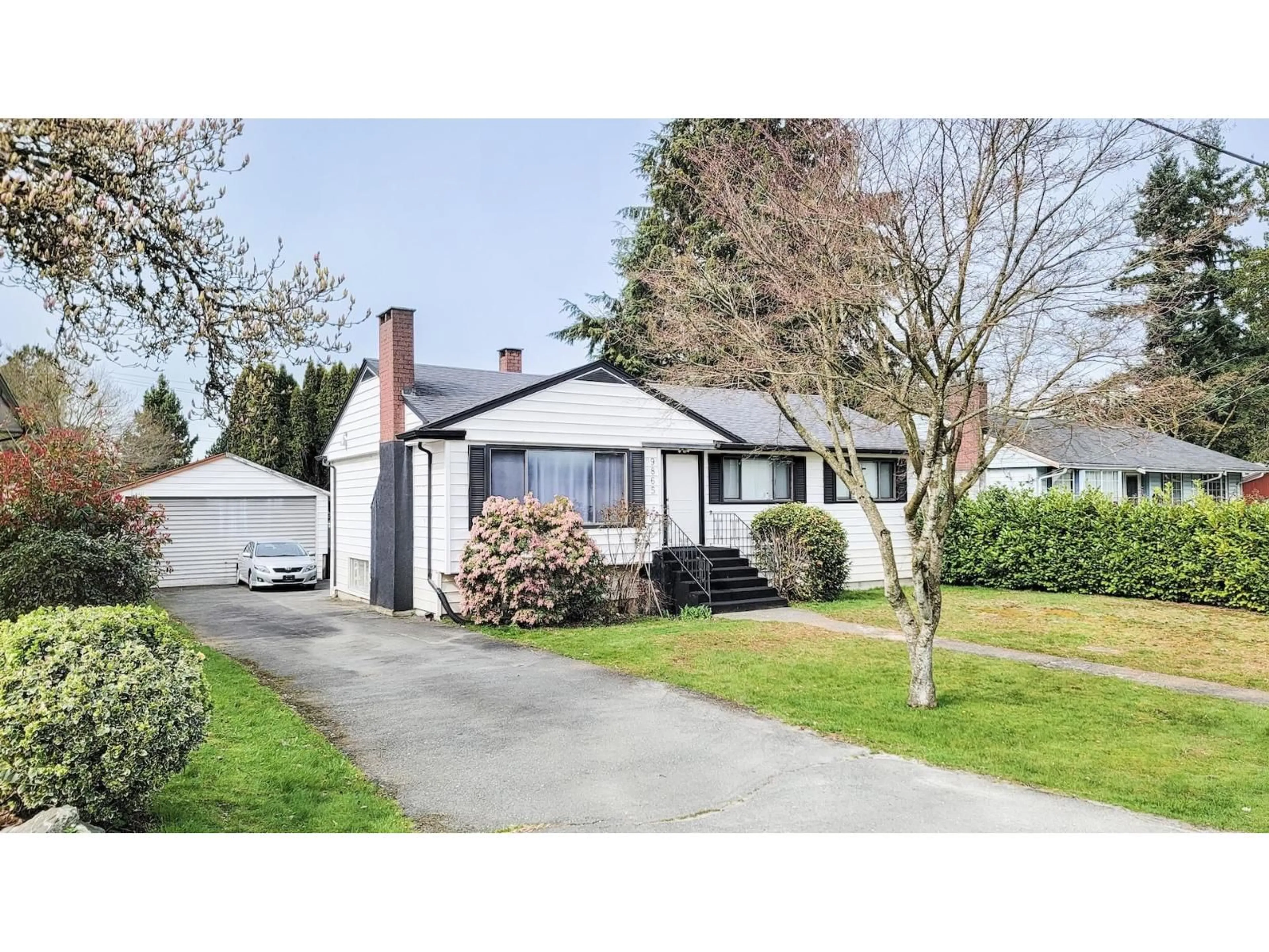 Home with vinyl exterior material, street for 9865 128A STREET, Surrey British Columbia V3T3E2