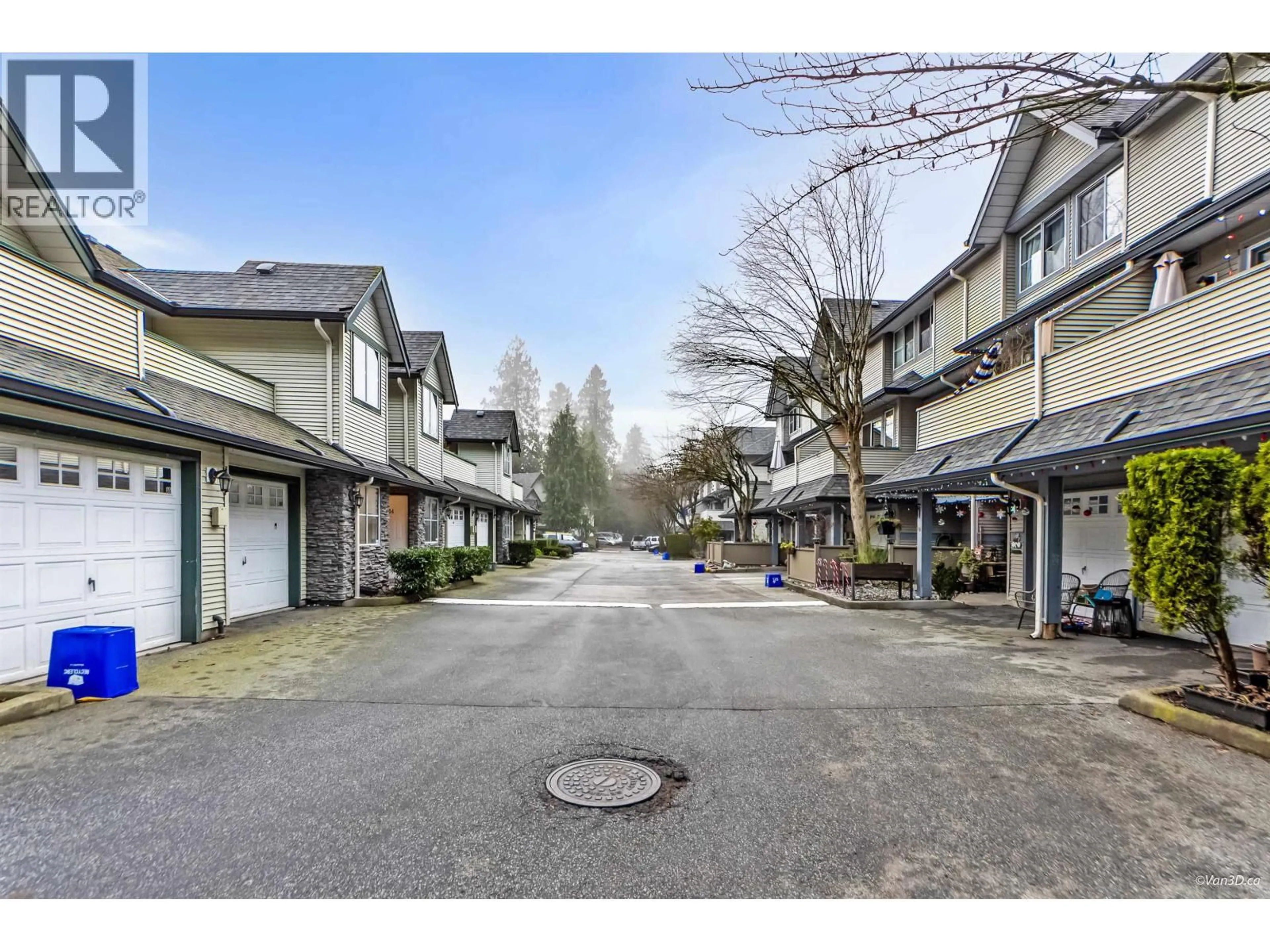 A pic from outside/outdoor area/front of a property/back of a property/a pic from drone, street for 56 - 19034 MCMYN ROAD, Pitt Meadows British Columbia V3Y2N8