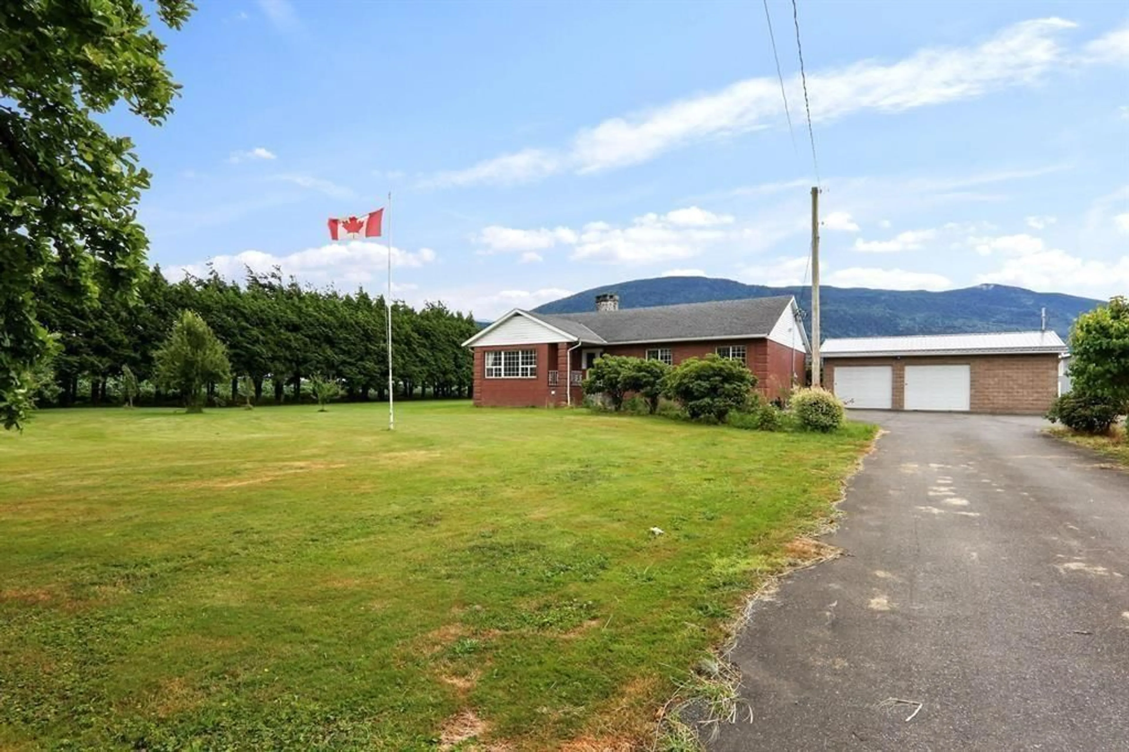 A pic from outside/outdoor area/front of a property/back of a property/a pic from drone, mountain view for 42832 KEITH WILSON ROAD, Chilliwack British Columbia V2R4B3