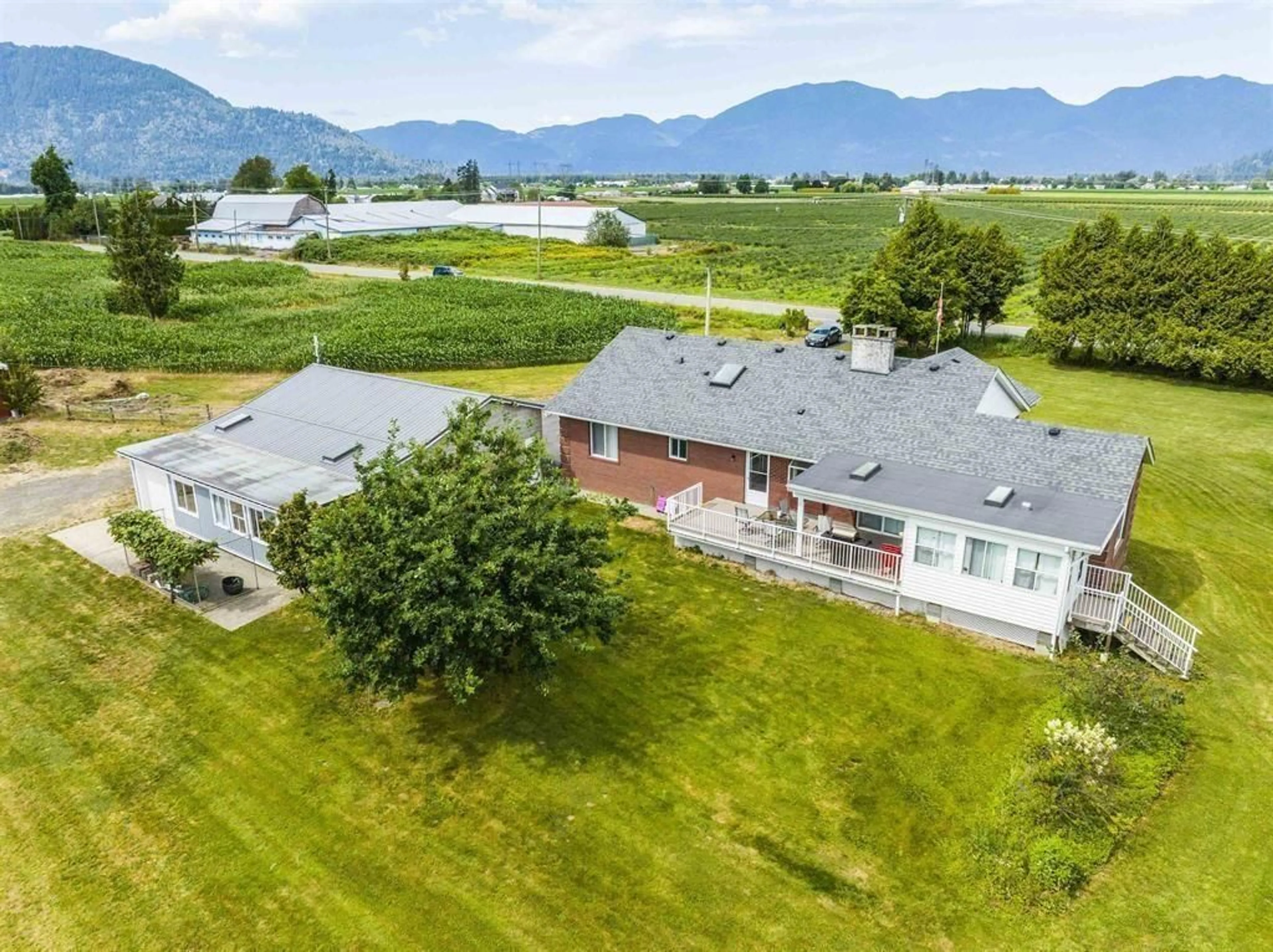 A pic from outside/outdoor area/front of a property/back of a property/a pic from drone, mountain view for 42832 KEITH WILSON ROAD, Chilliwack British Columbia V2R4B3