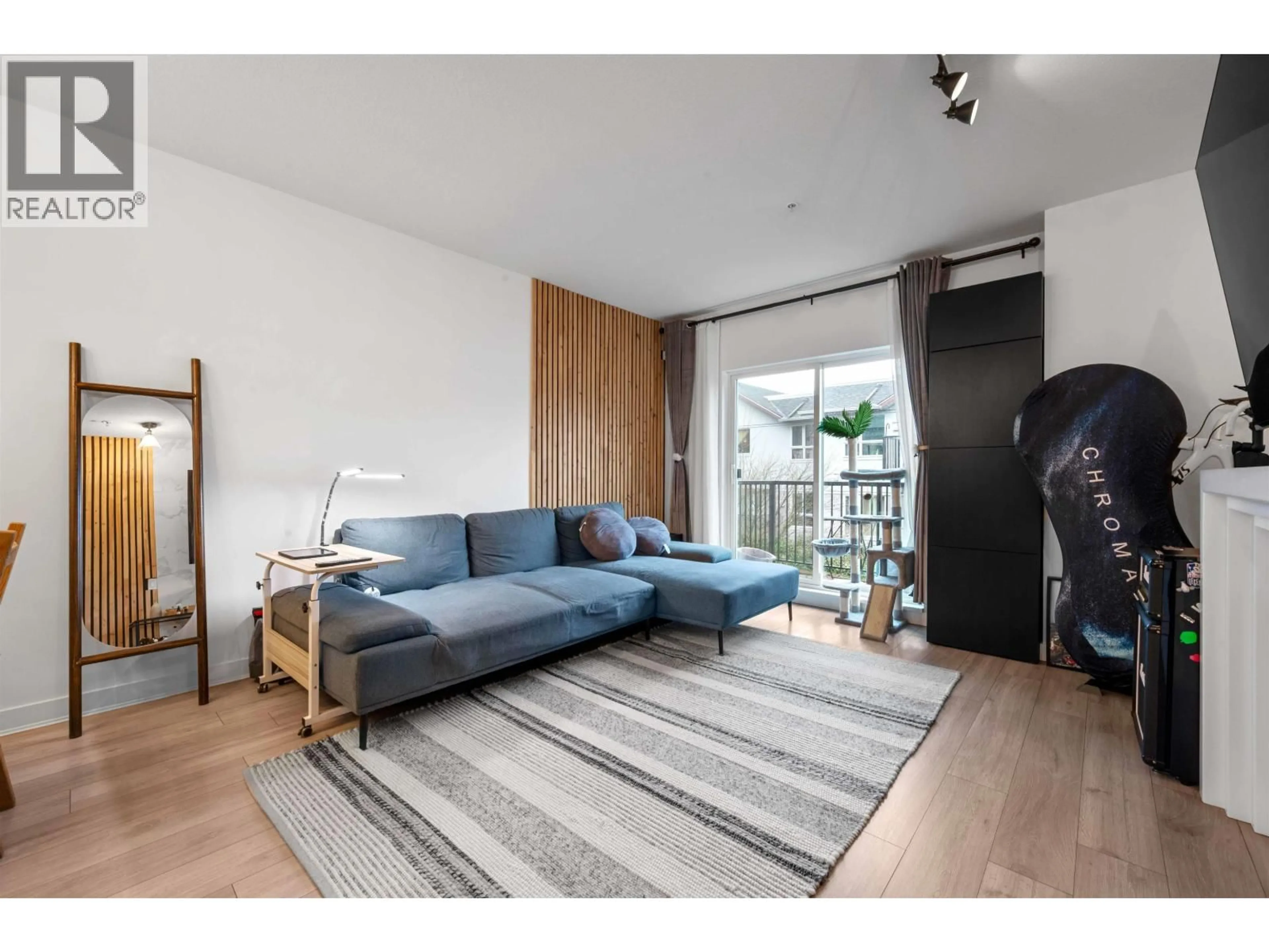 Living room with furniture, wood/laminate floor for 225 - 3888 NORFOLK STREET, Burnaby British Columbia V5G1E5