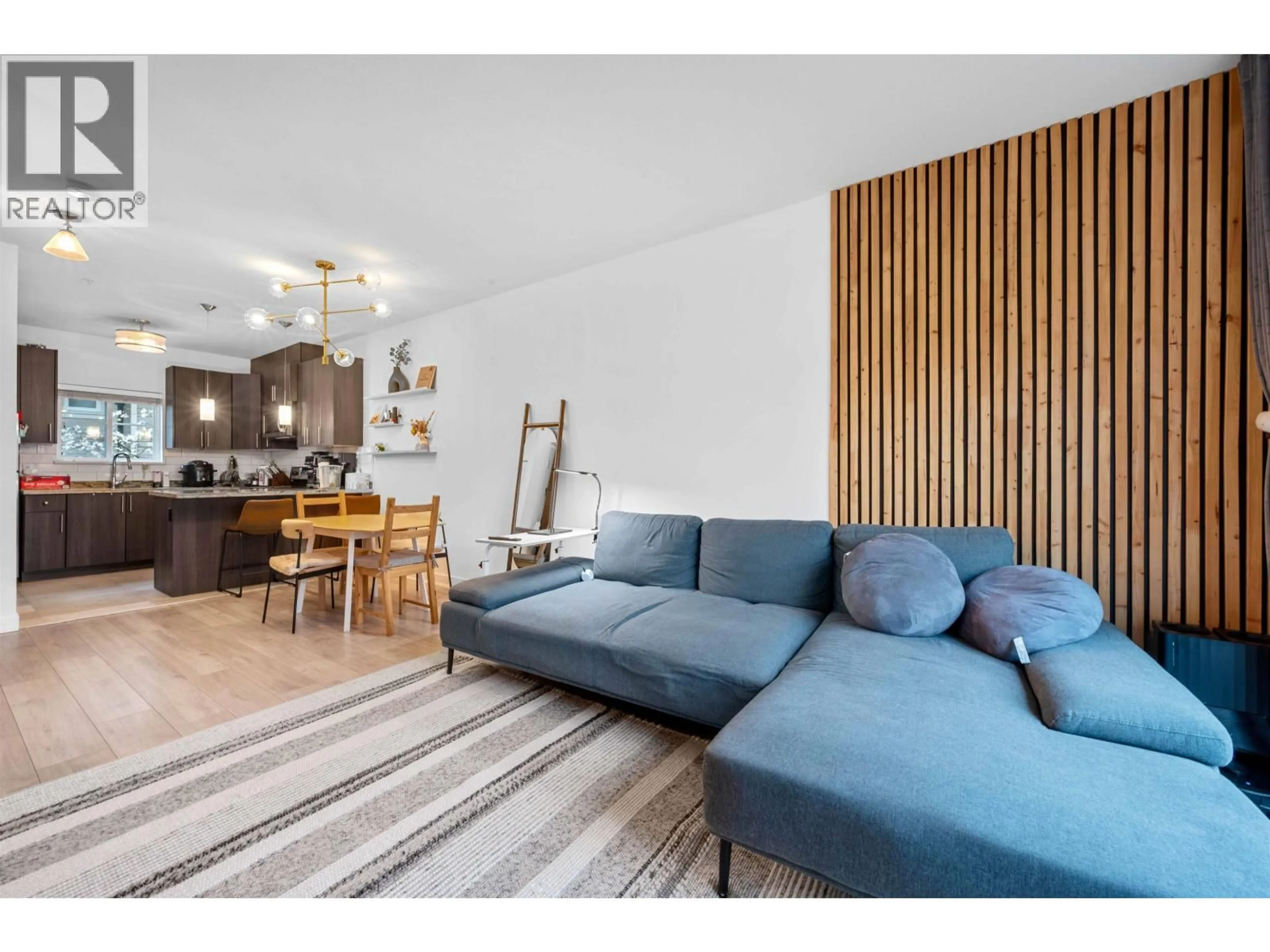 Living room with furniture, wood/laminate floor for 225 - 3888 NORFOLK STREET, Burnaby British Columbia V5G1E5