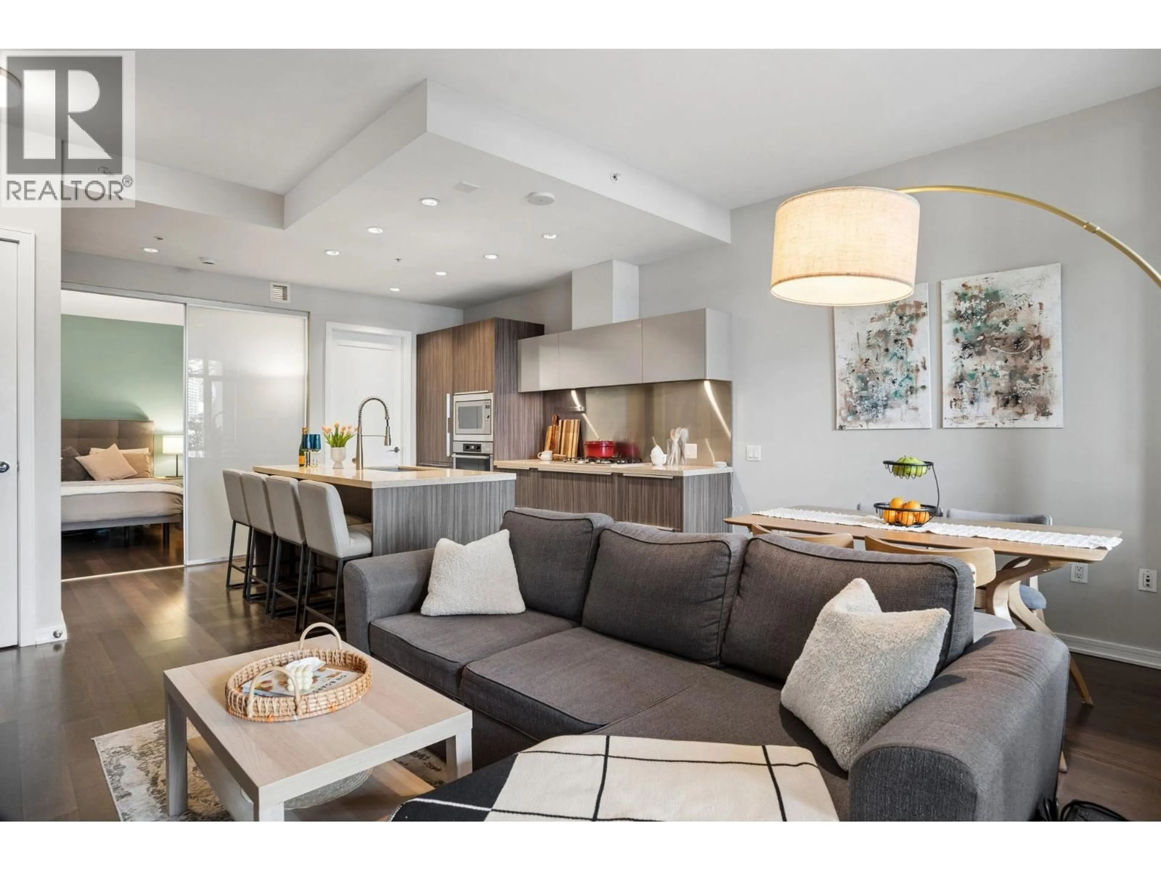 Open concept kitchen, unknown for 102 - 128 ATHLETES WAY, Vancouver British Columbia V5Y0B5