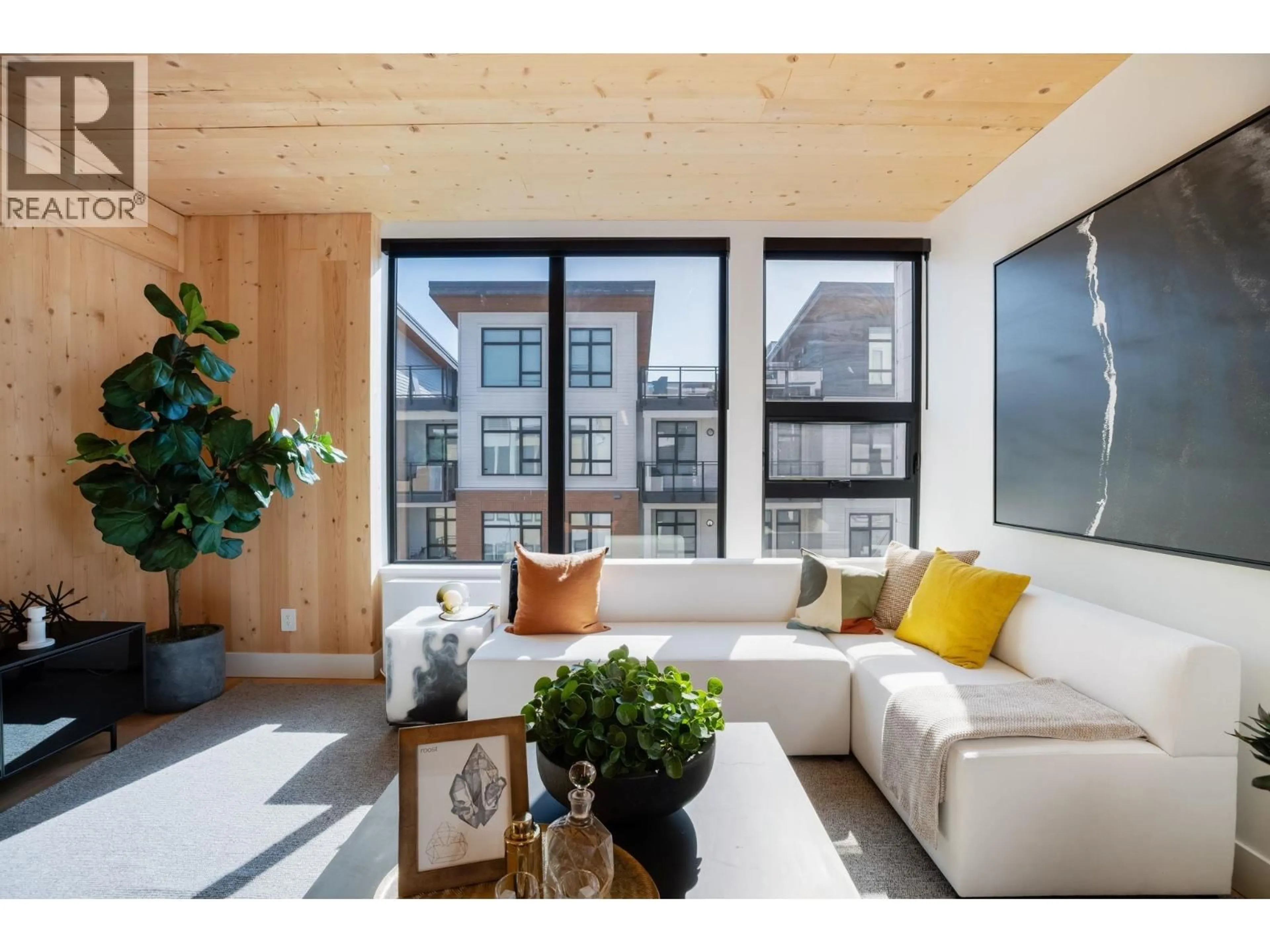 Living room with furniture, wood/laminate floor for 414 - 310 SALTER STREET, New Westminster British Columbia V3M0N7