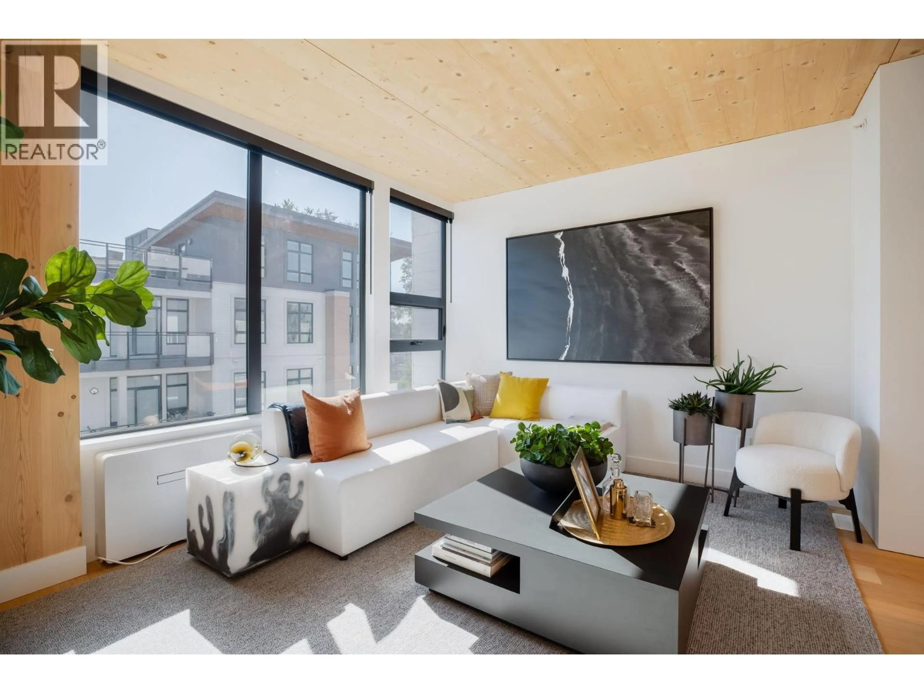 Living room with furniture, wood/laminate floor for 414 - 310 SALTER STREET, New Westminster British Columbia V3M0N7