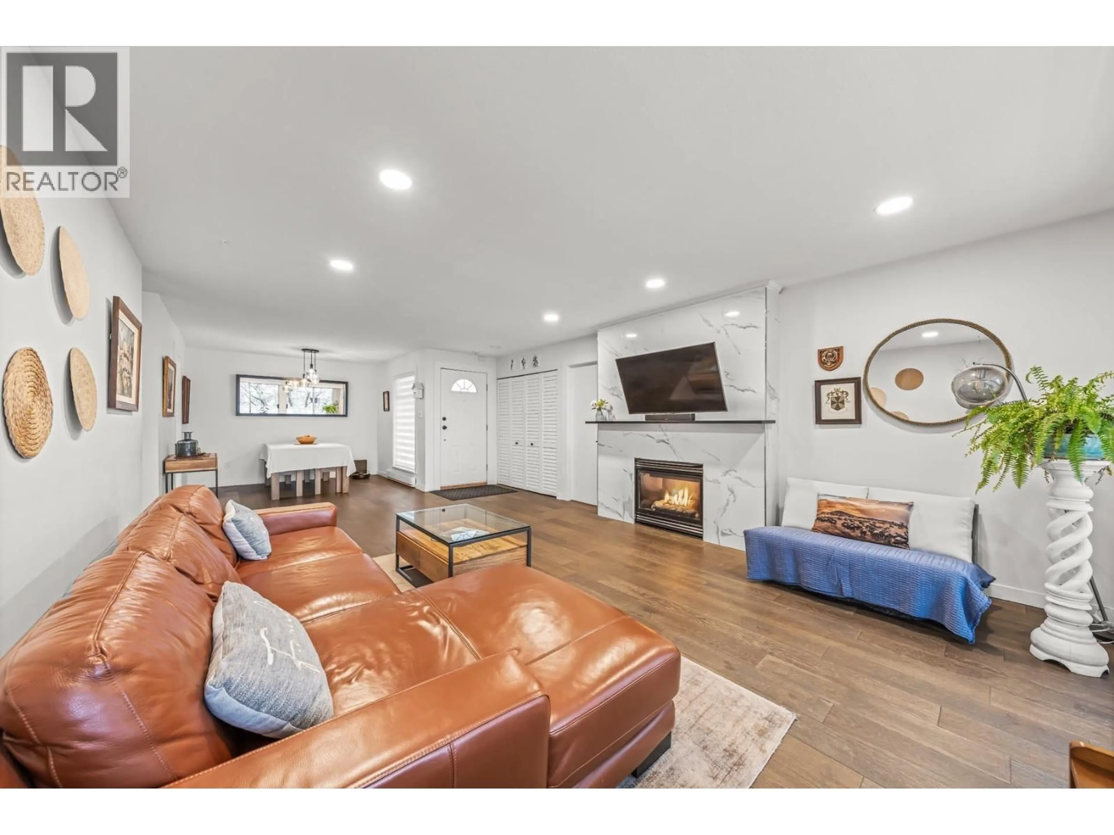 Living room with furniture, unknown for 203 - 2733 ATLIN PLACE, Coquitlam British Columbia V3C5B1