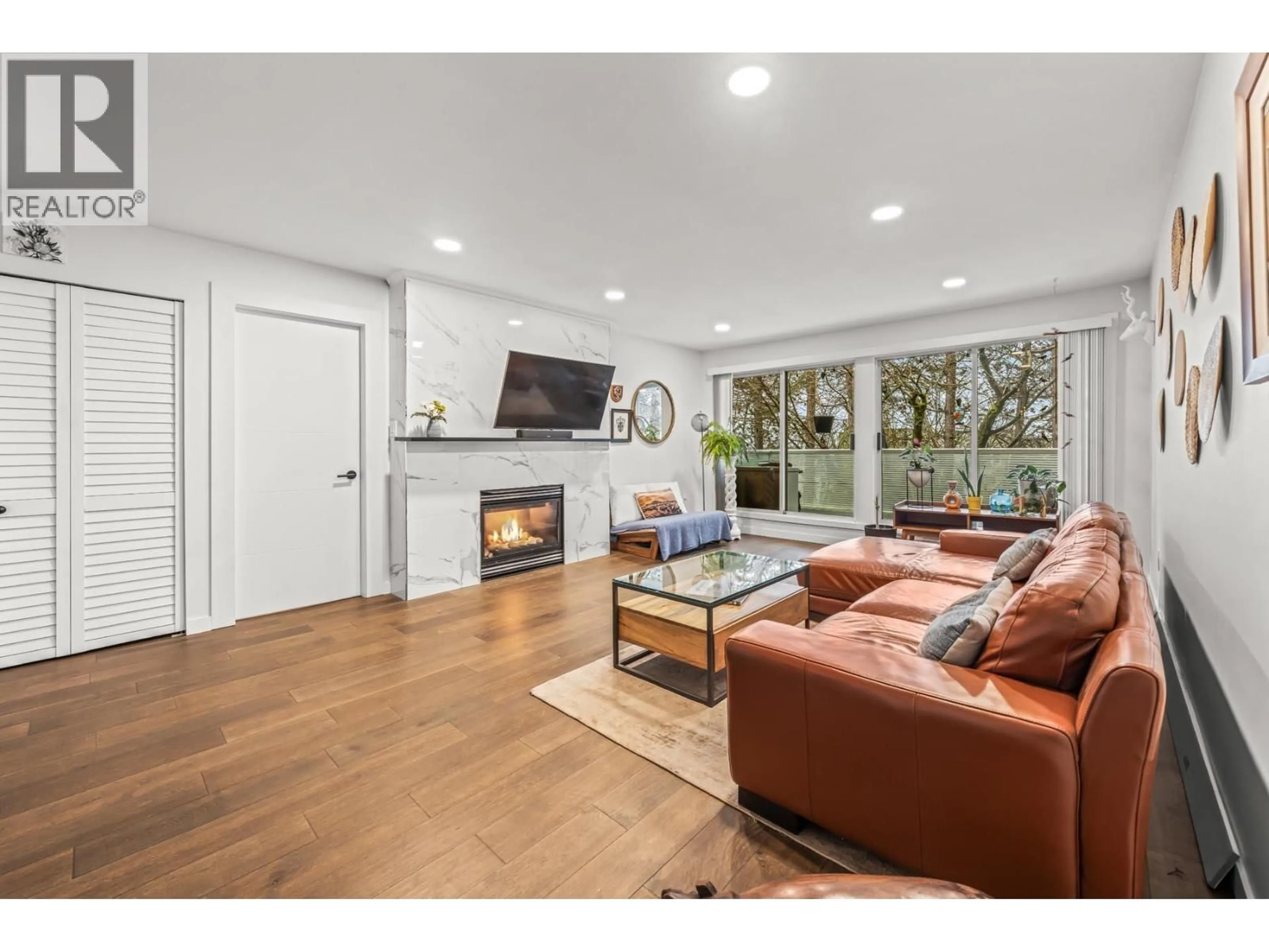 Living room with furniture, unknown for 203 - 2733 ATLIN PLACE, Coquitlam British Columbia V3C5B1