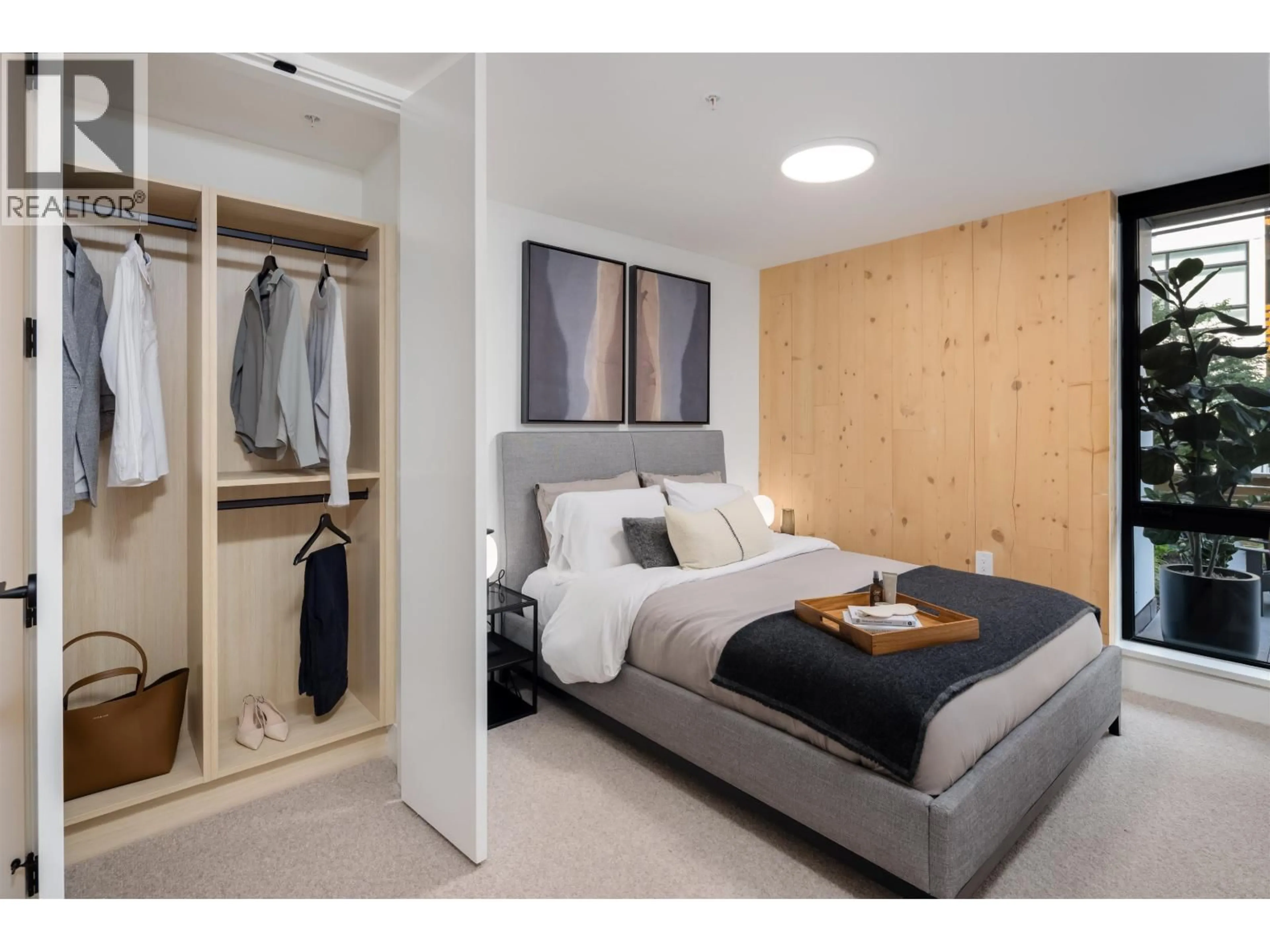 Bedroom with bed, wood/laminate floor for 103 - 310 SALTER STREET, New Westminster British Columbia V3M0N7