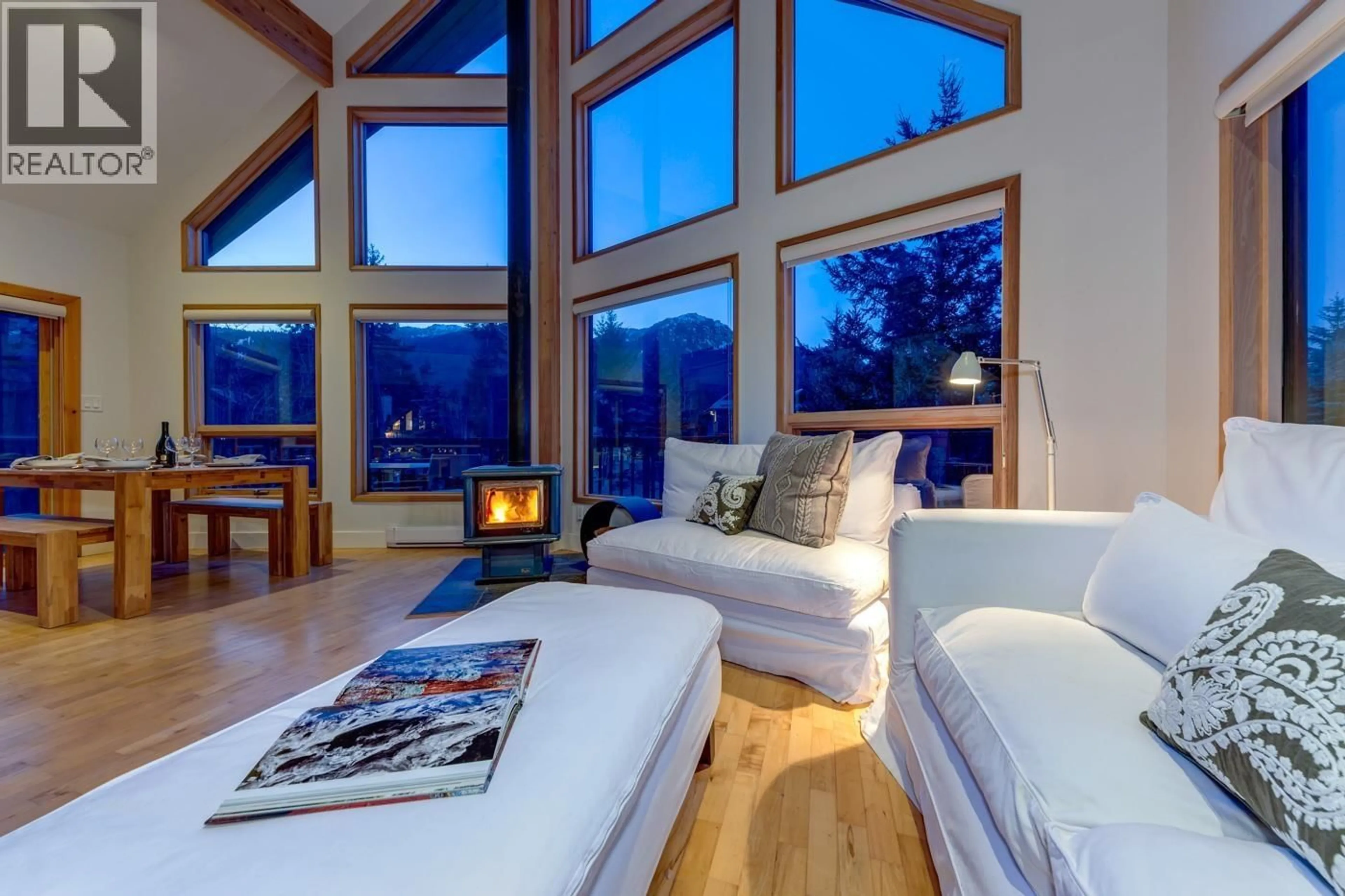 Living room with furniture, wood/laminate floor for 2748 COYOTE PLACE, Whistler British Columbia V8E0A8