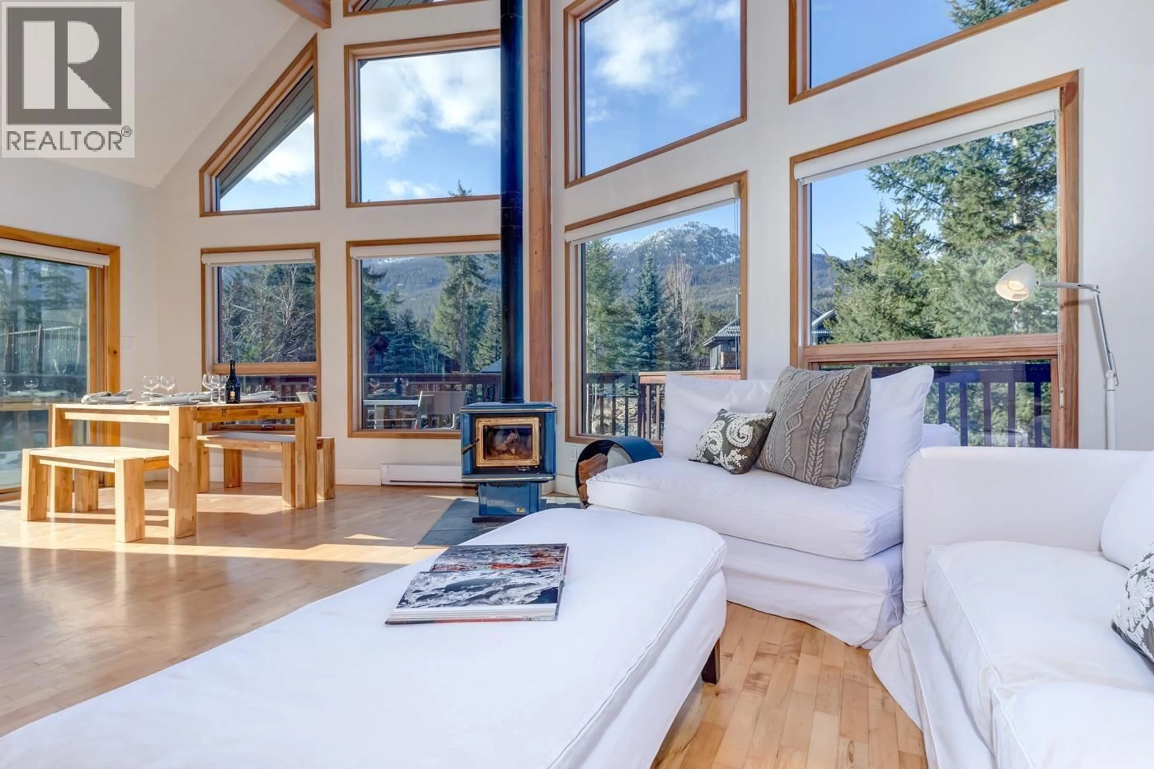 Living room with furniture, wood/laminate floor for 2748 COYOTE PLACE, Whistler British Columbia V8E0A8