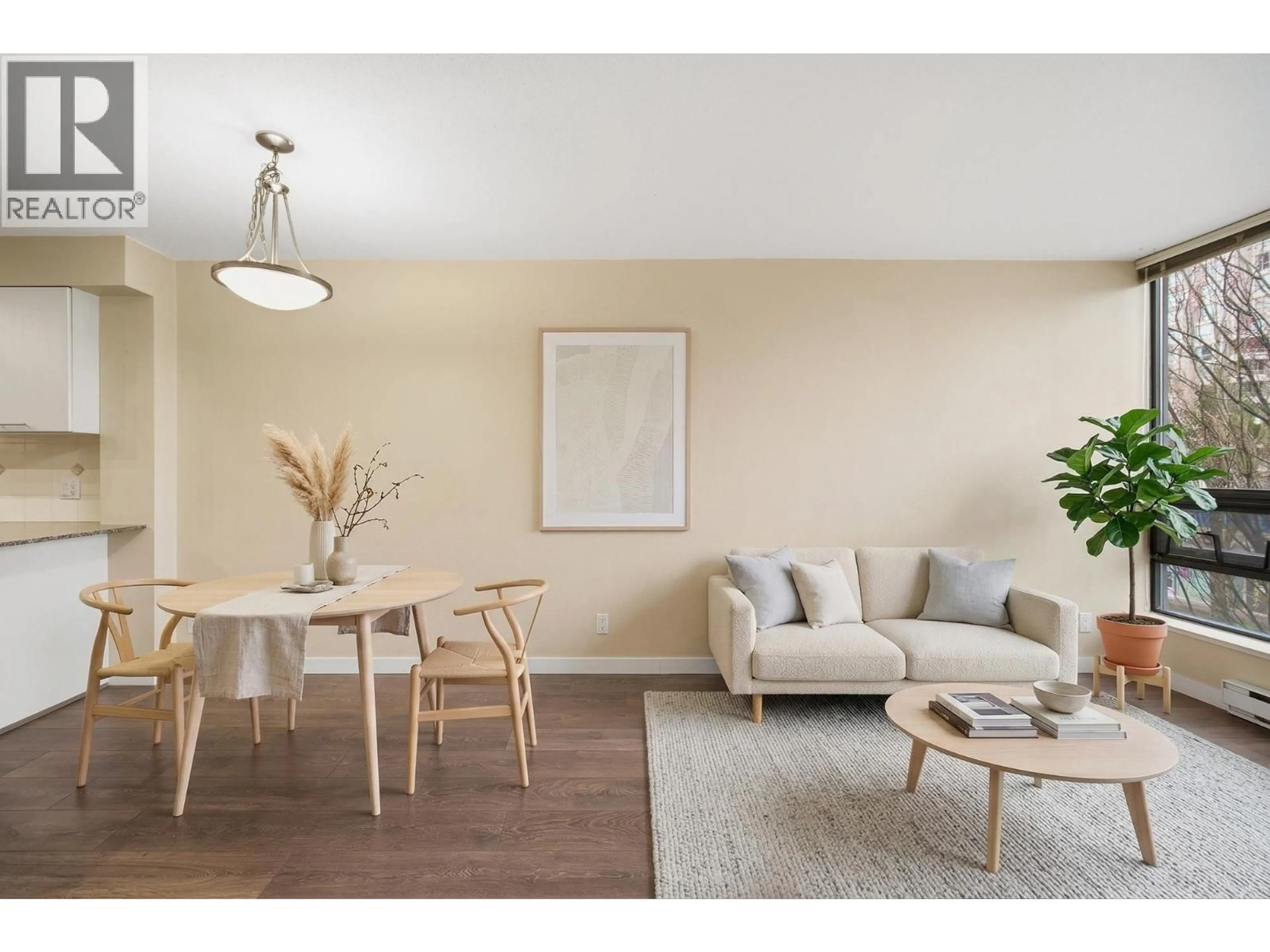 Living room with furniture, wood/laminate floor for 303 - 6331 BUSWELL STREET, Richmond British Columbia V6Y4H2