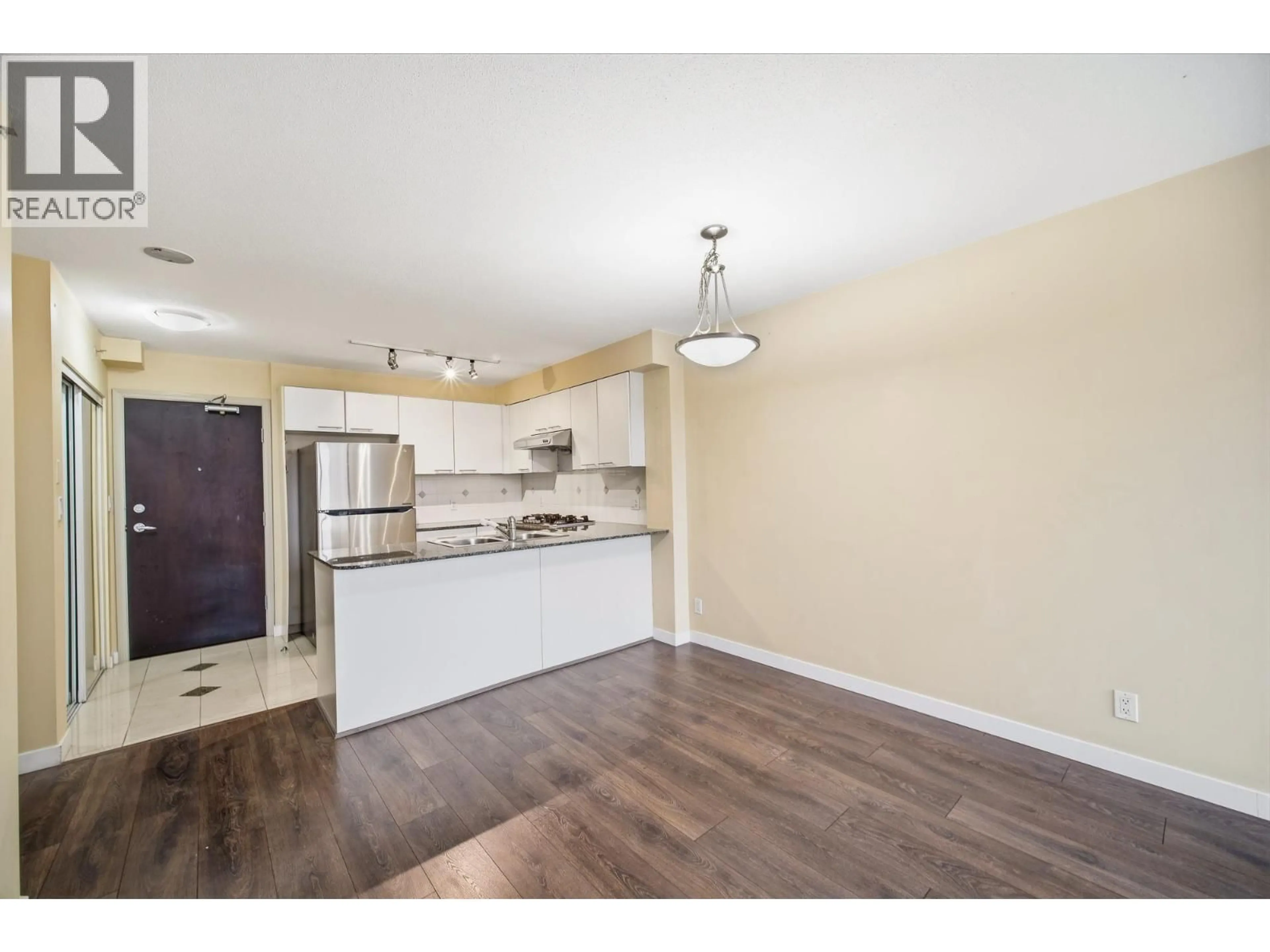 Open concept kitchen, wood/laminate floor for 303 - 6331 BUSWELL STREET, Richmond British Columbia V6Y4H2