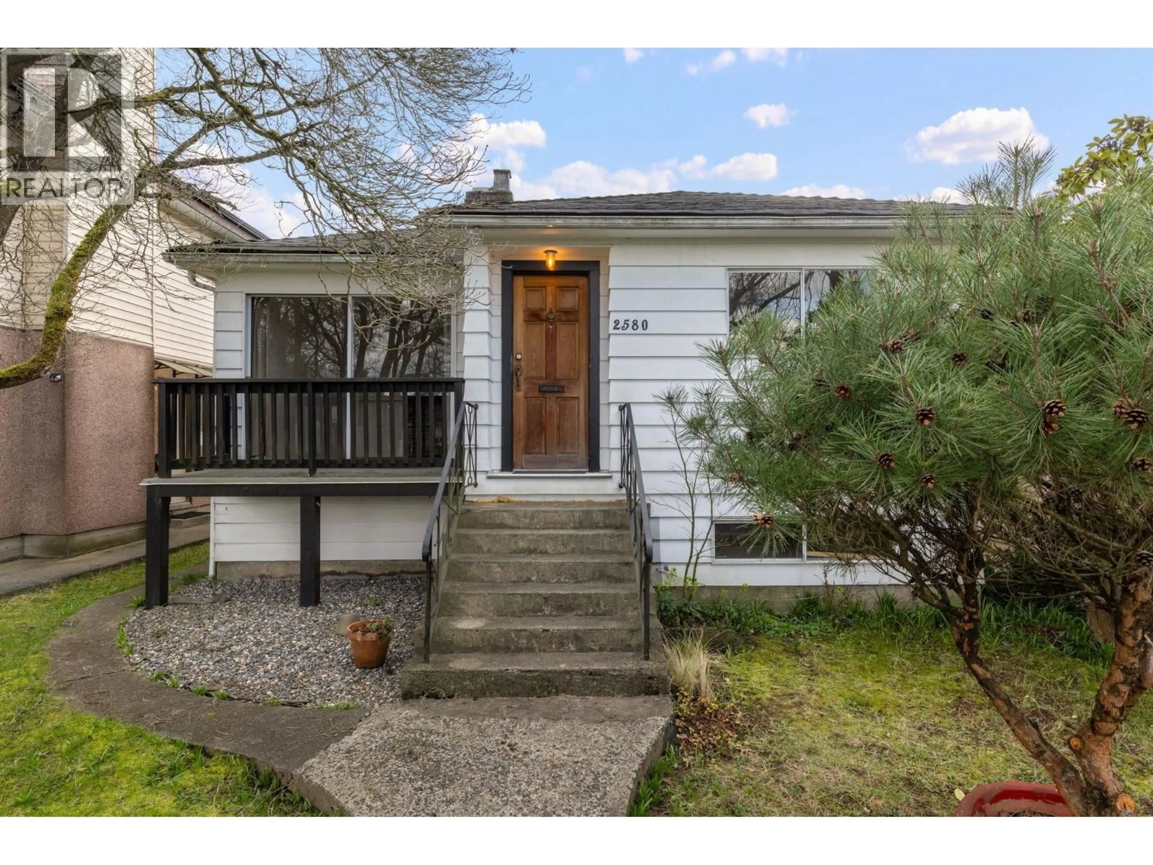 Home with vinyl exterior material, street for 2580 19TH AVENUE, Vancouver British Columbia V5M2S3