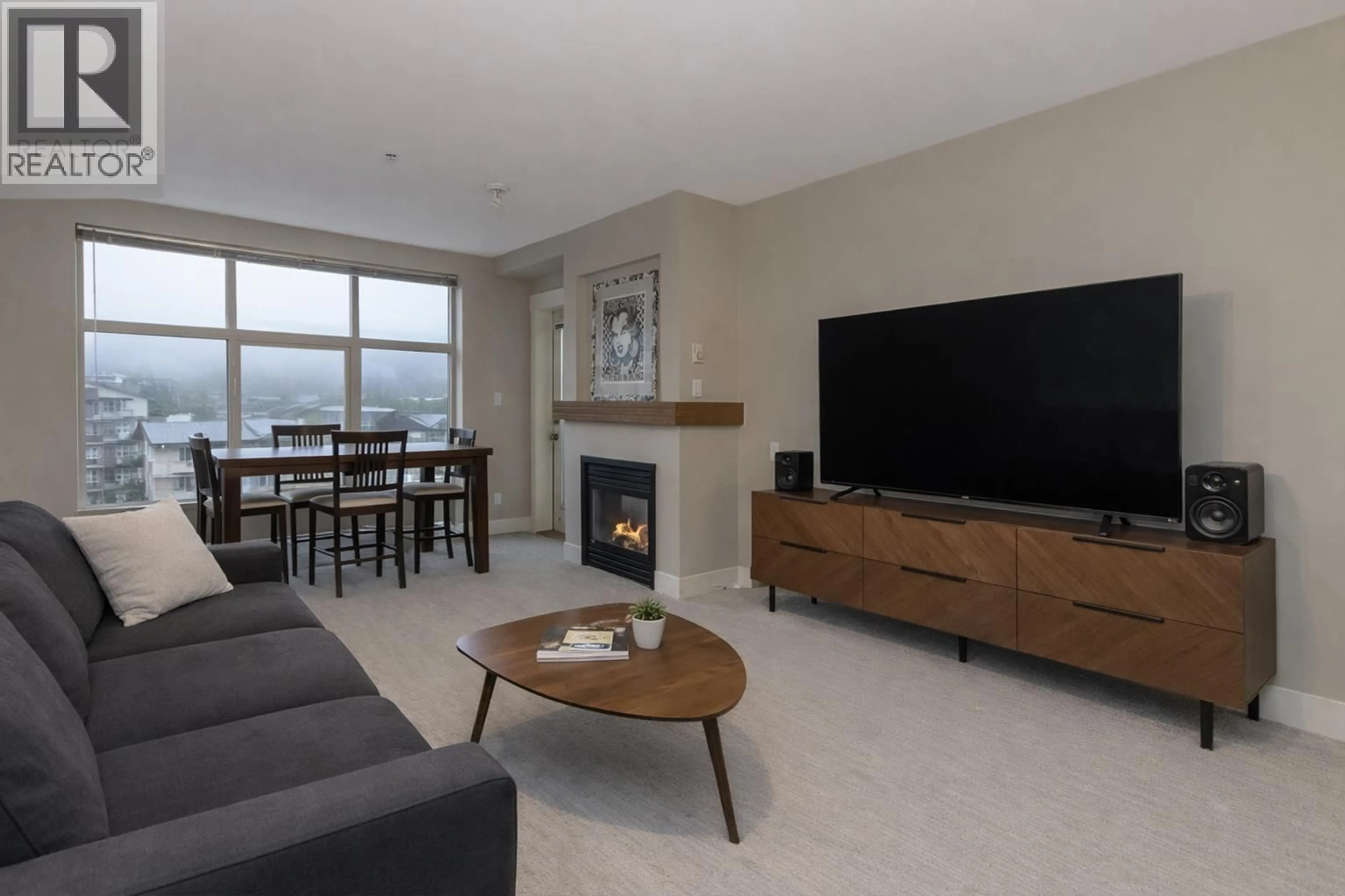 Living room with furniture, unknown for 402 - 1211 VILLAGE GREEN WAY, Squamish British Columbia V8B0R7